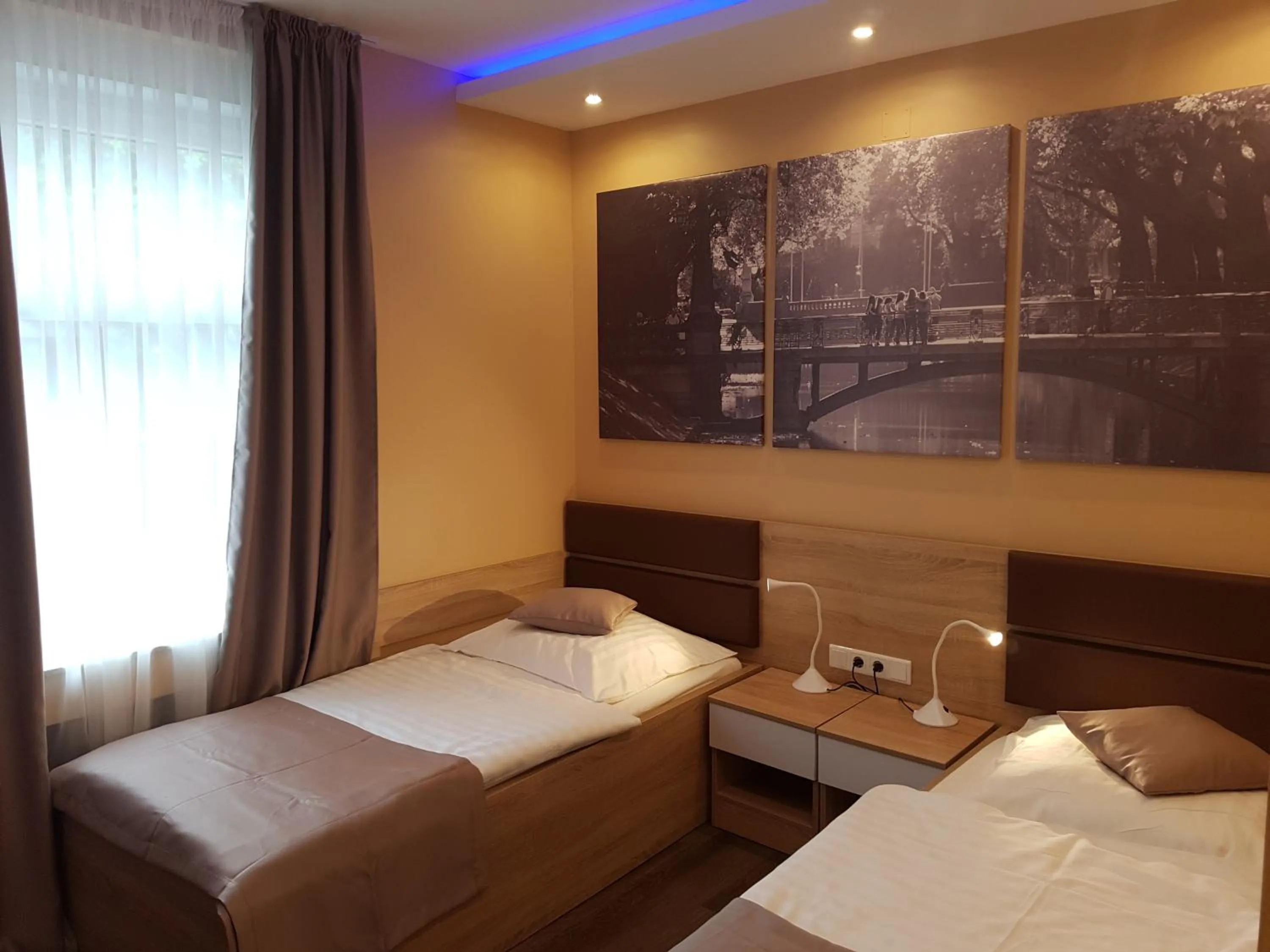 Photo of the whole room, Bed in Hotel Haus Büderich