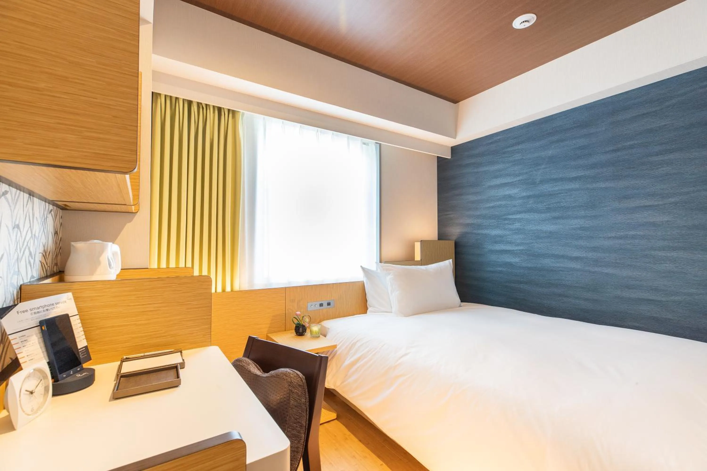 Photo of the whole room, Bed in Daiwa Roynet Hotel Nagoya Fushimi