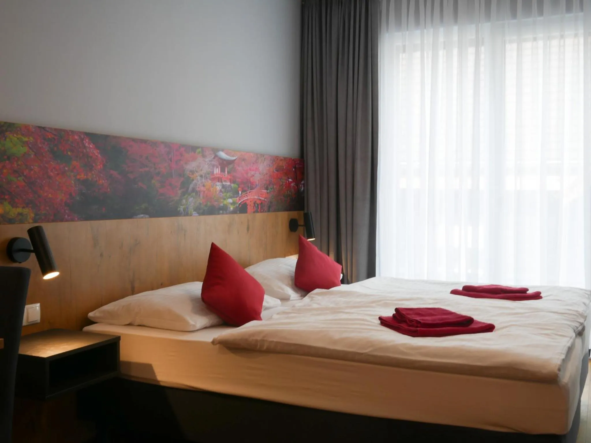Bed in Hotel Linde-Sinohaus