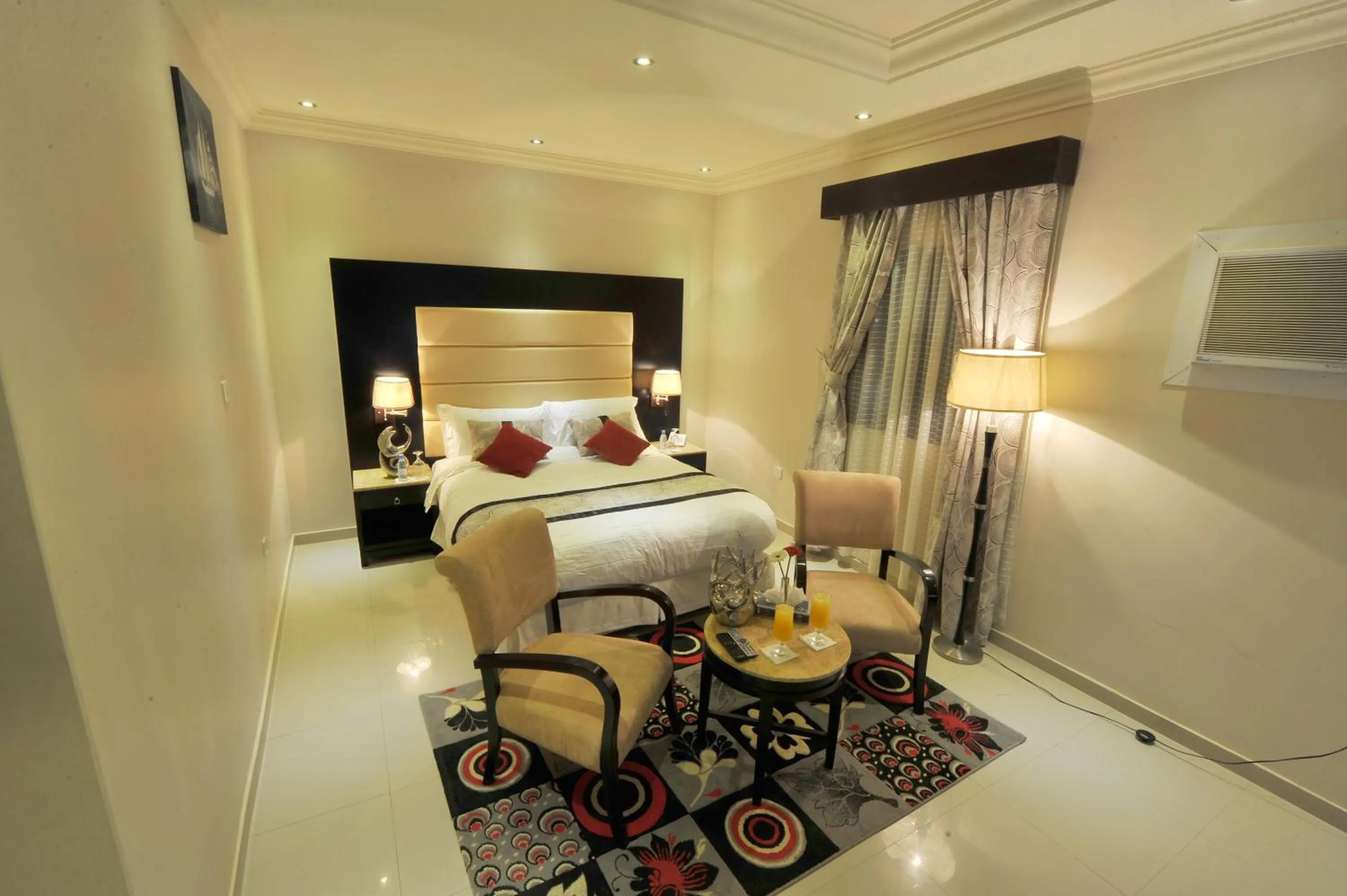 Photo of the whole room, Bed in Al Janaderia Suites 7