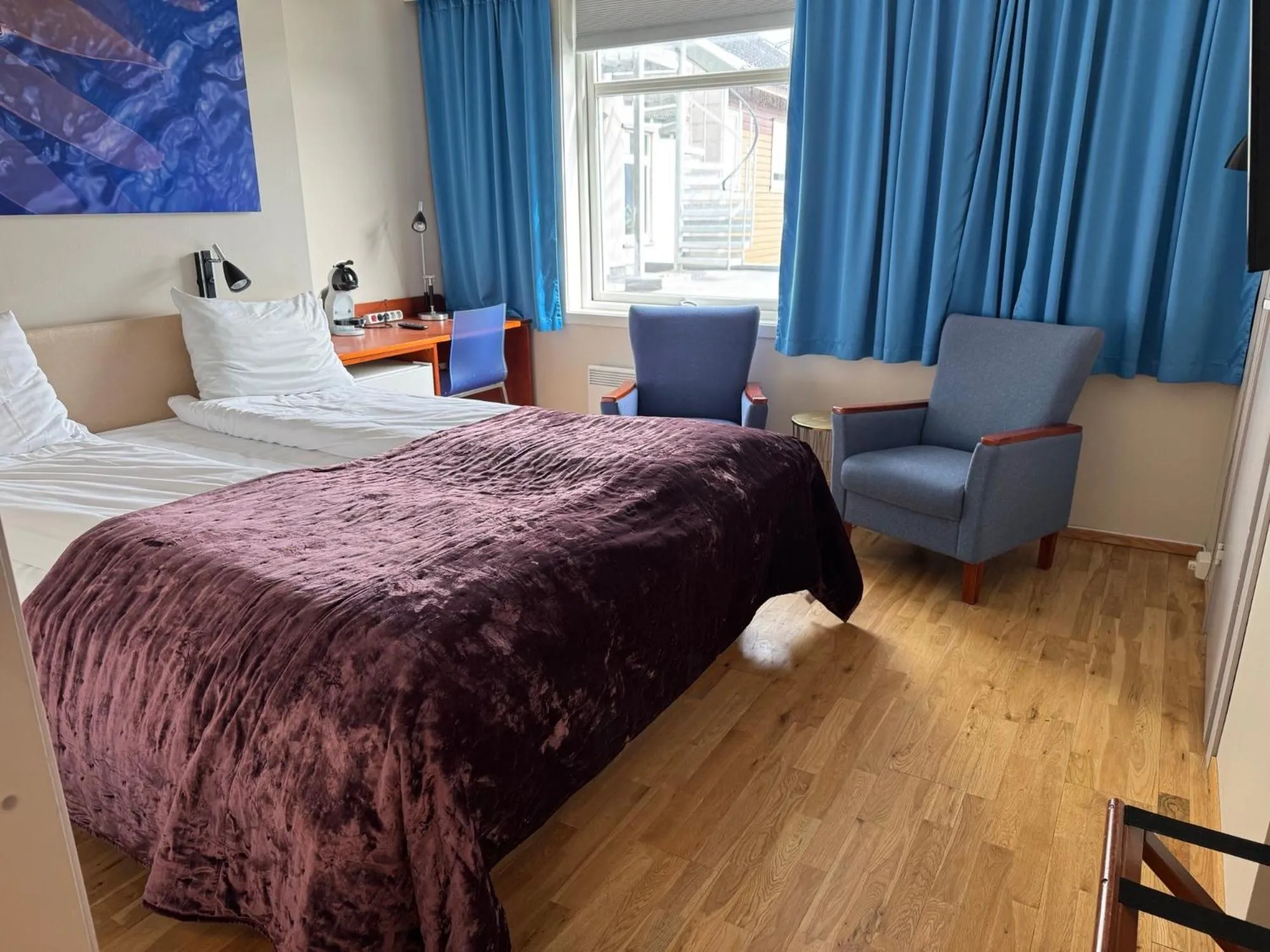 Seating area, Bed in Hotel Marena