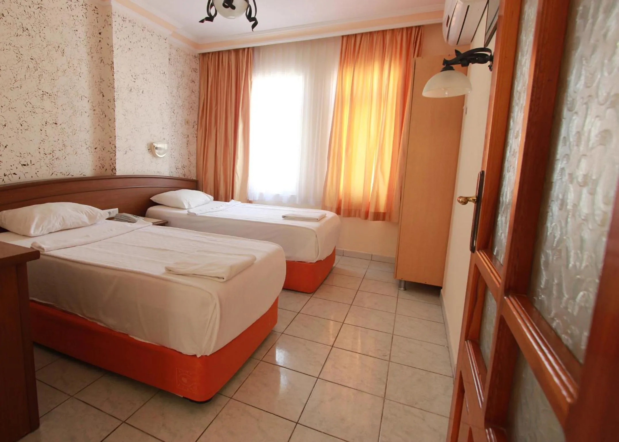 Photo of the whole room, Bed in Baronessa Apart Hotel