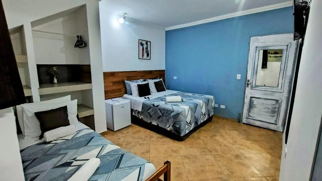 Bedroom, Bed in Hotel Pousada Iracemar - Piscina Aquecida