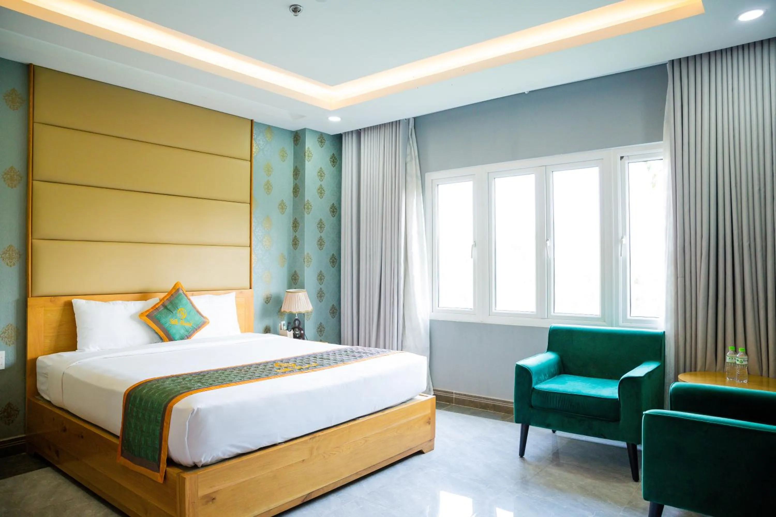 Photo of the whole room, Bed in Silk Hotel near Tan Son Nhat Airport