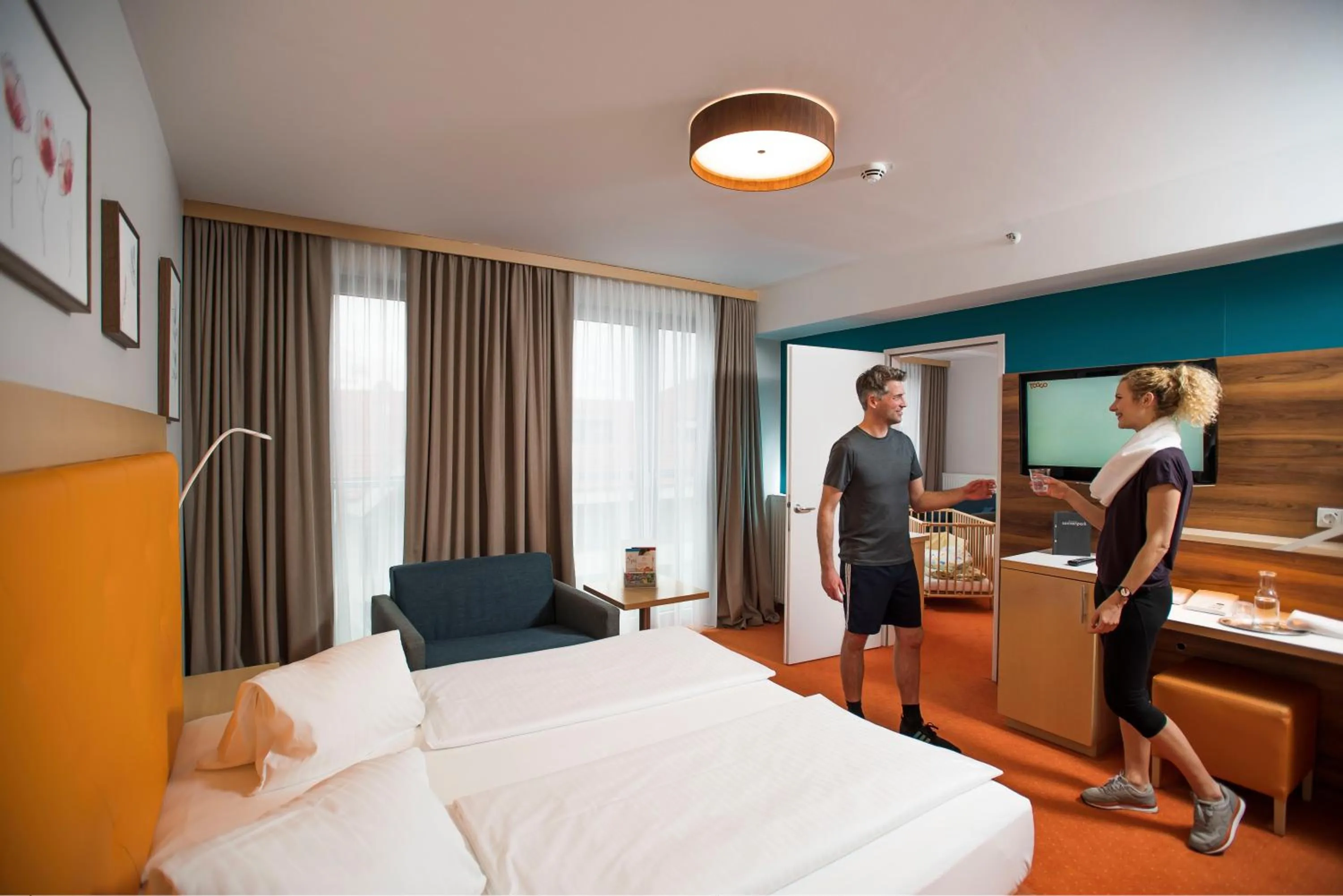 Photo of the whole room, Bed in Hotel Sonnenpark & Therme included - auch am An- & Abreisetag!