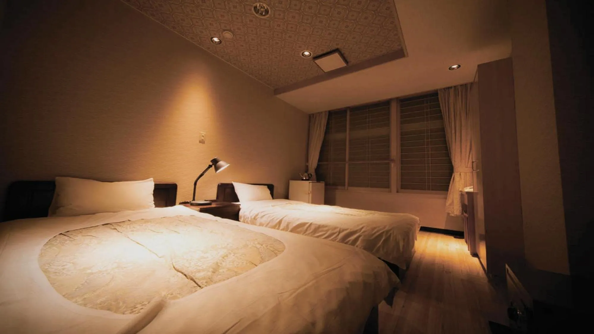 Bed in Aizu Higashiyama Onsen "Tsuki no Akari" self-service INN