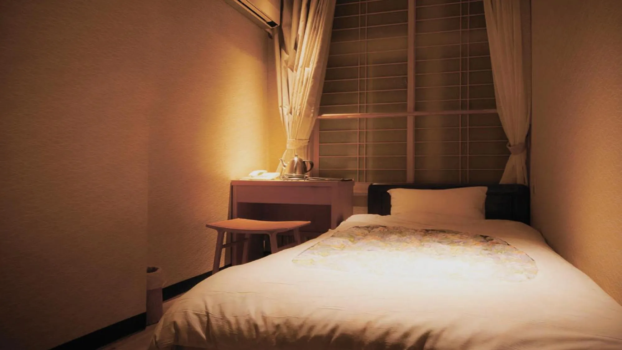 Bed in Aizu Higashiyama Onsen "Tsuki no Akari" self-service INN