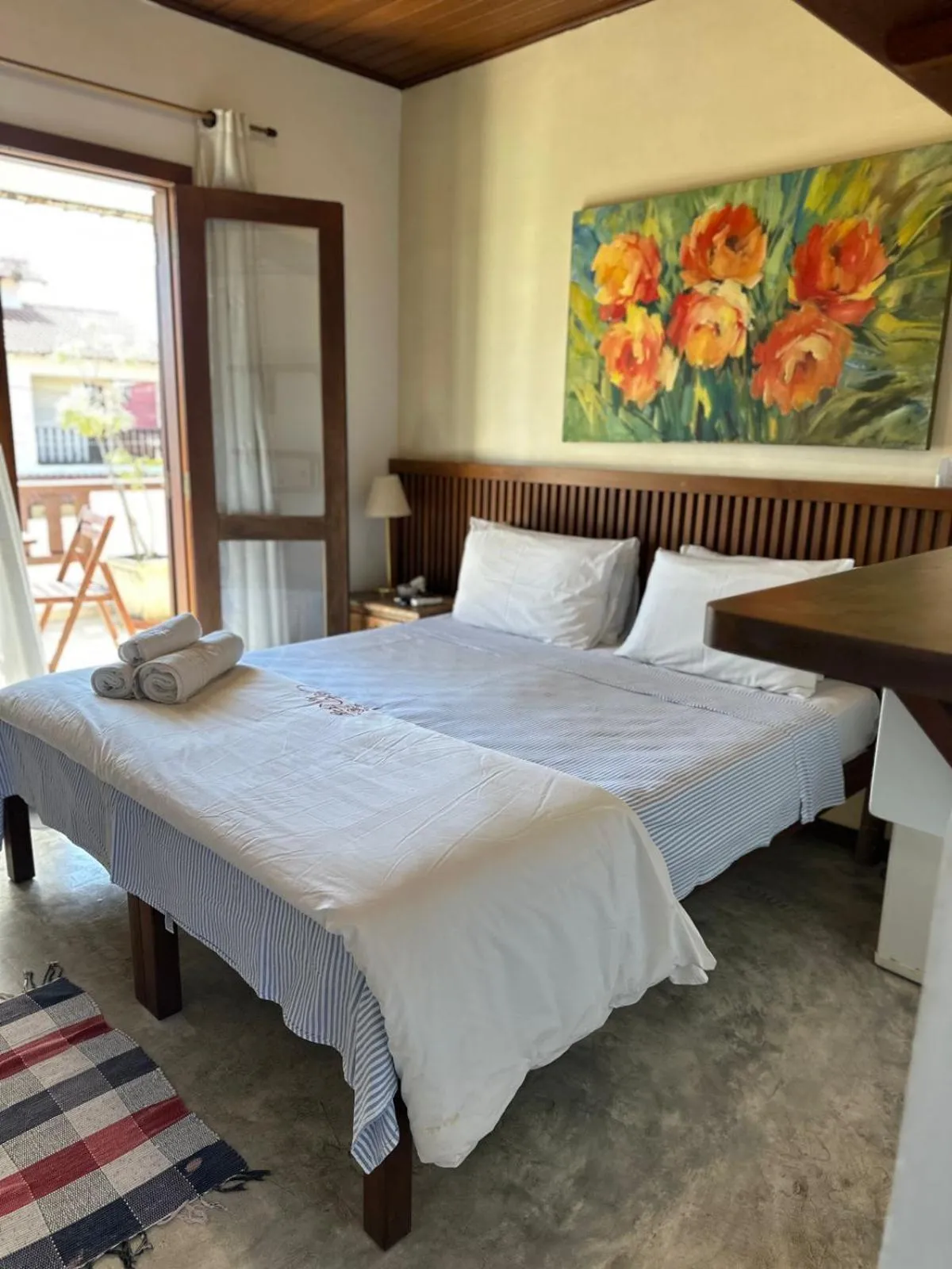 Bed in Pousada Casa das Rosas