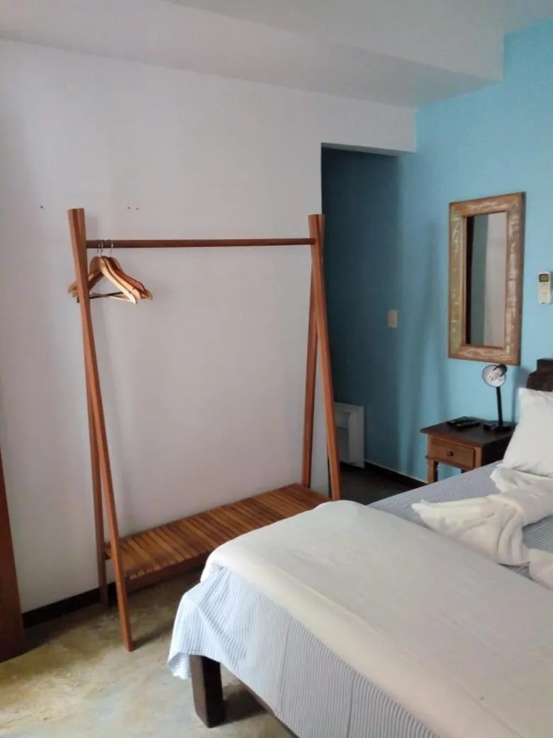 Photo of the whole room, Bed in Pousada Casa das Rosas