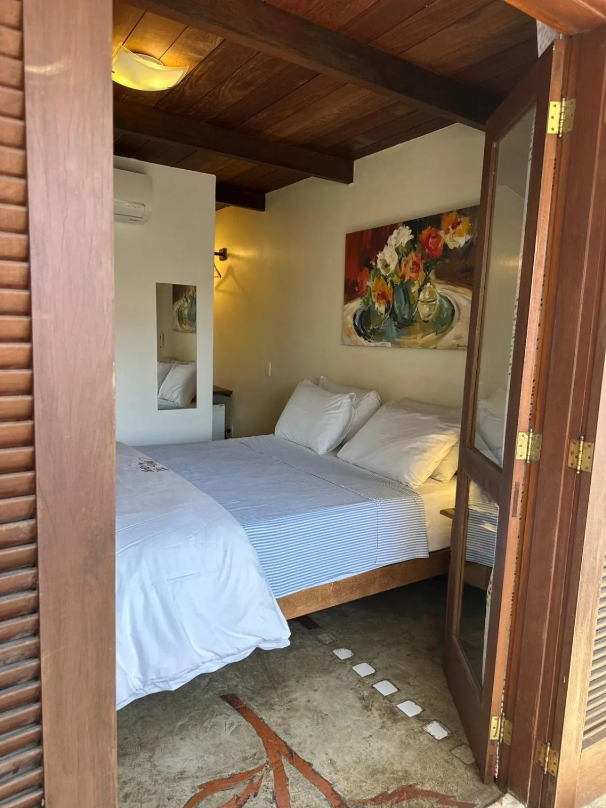 Bed in Pousada Casa das Rosas