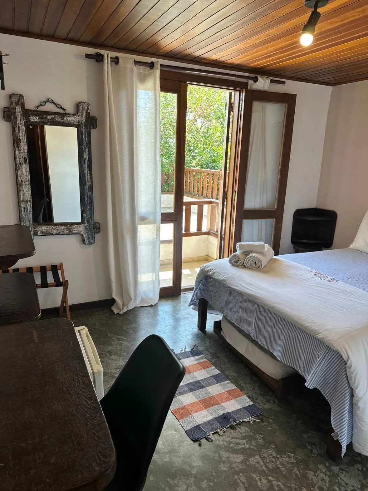 Bed in Pousada Casa das Rosas