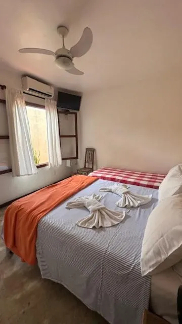 Photo of the whole room, Bed in Pousada Casa das Rosas