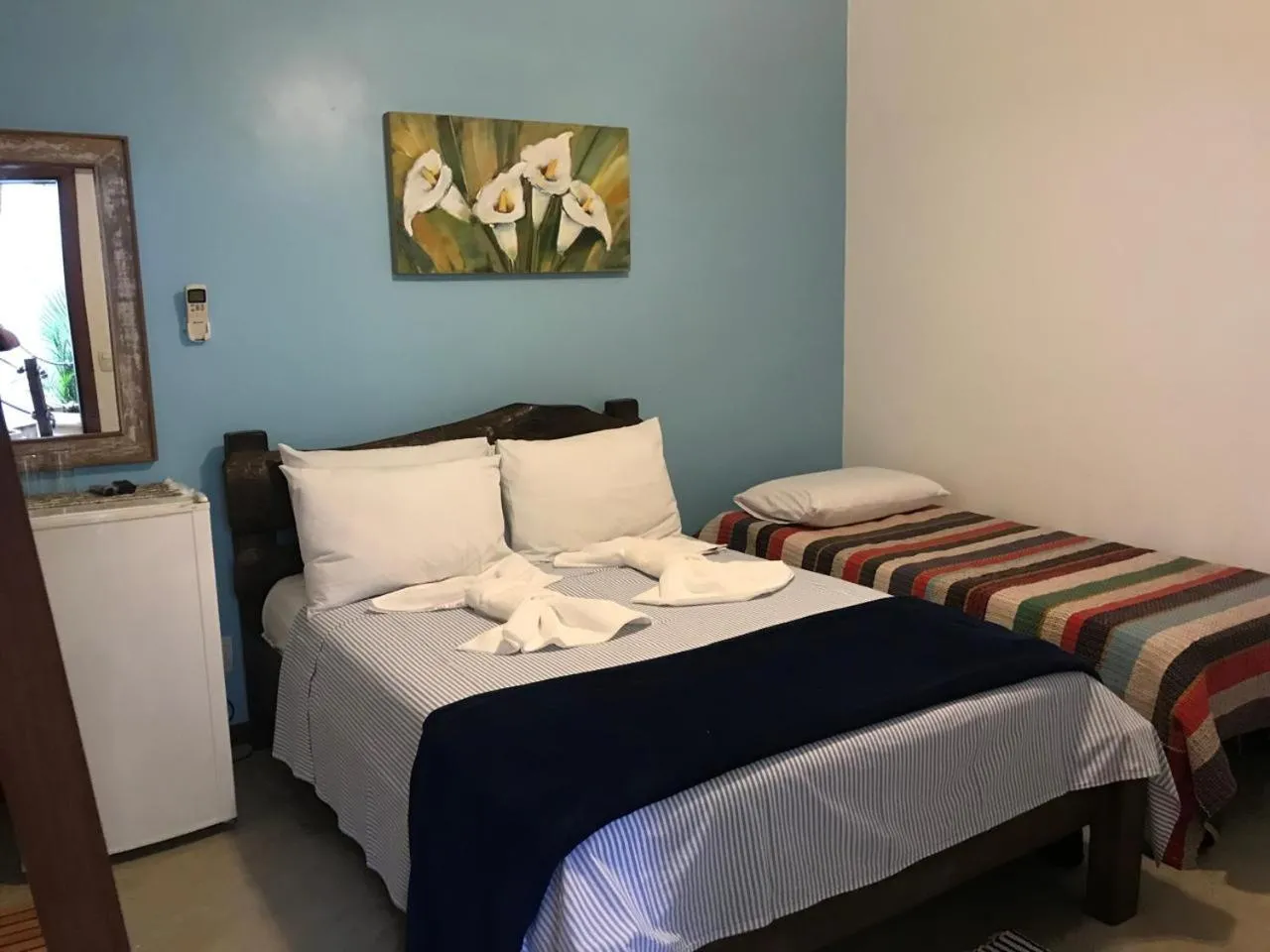 Bed in Pousada Casa das Rosas