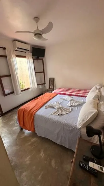 Photo of the whole room, Bed in Pousada Casa das Rosas