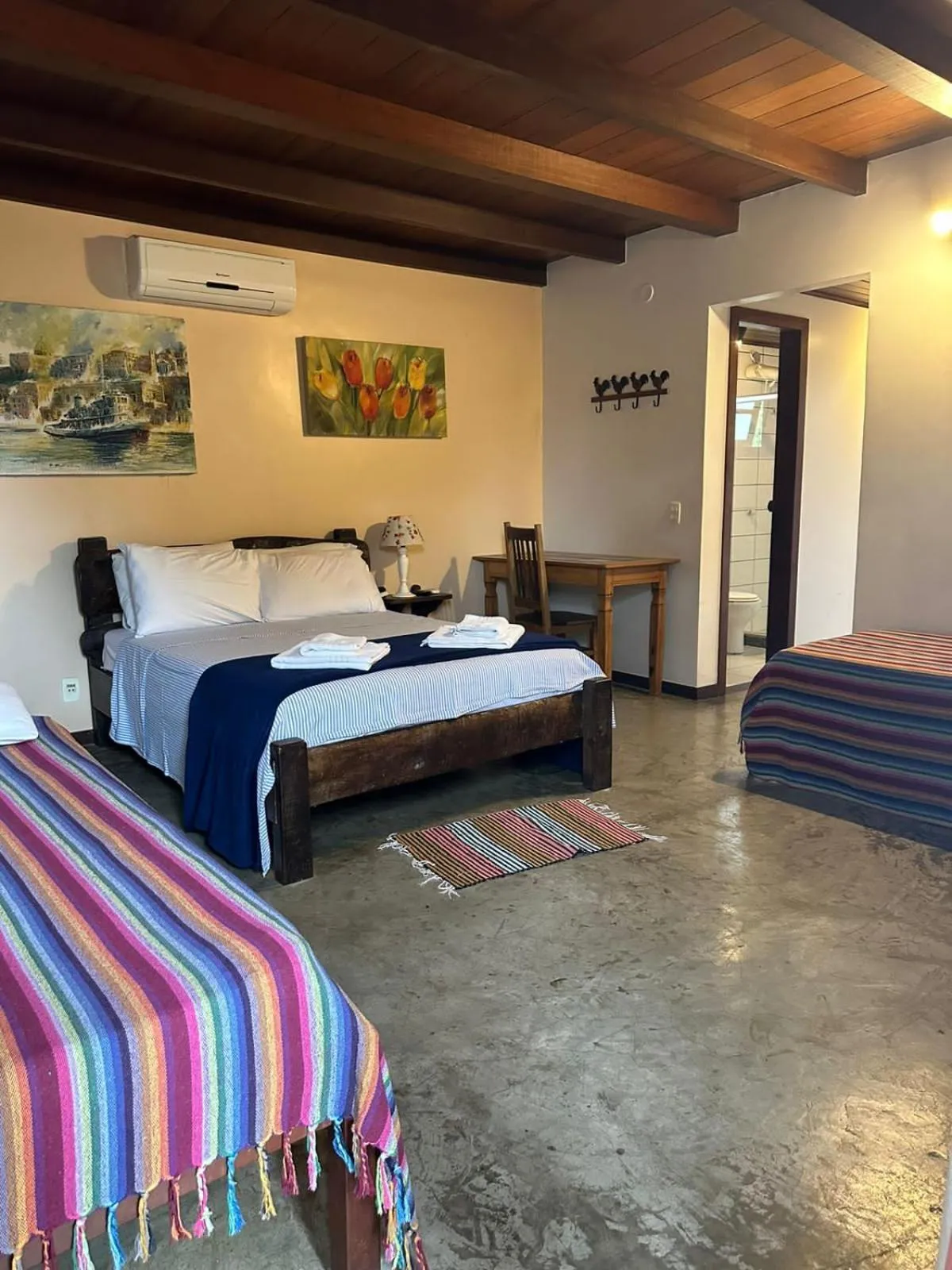 Photo of the whole room, Bed in Pousada Casa das Rosas