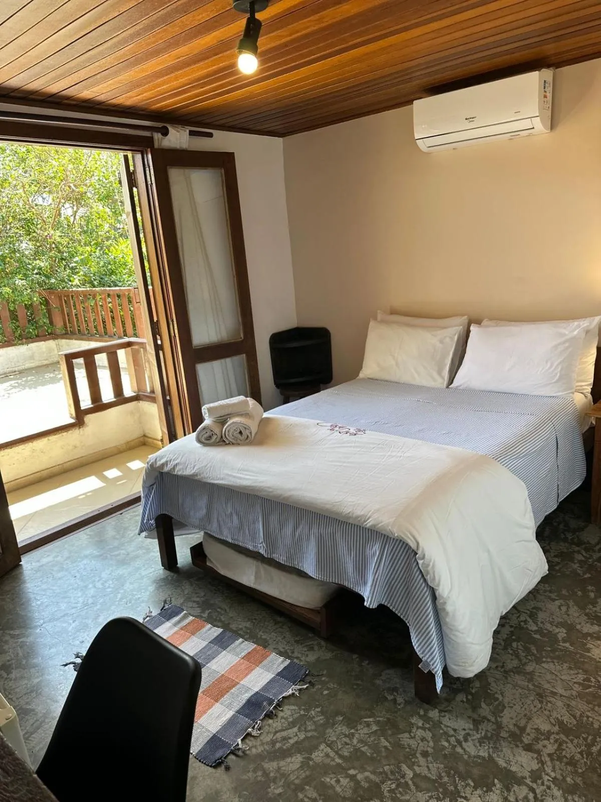 Bed in Pousada Casa das Rosas
