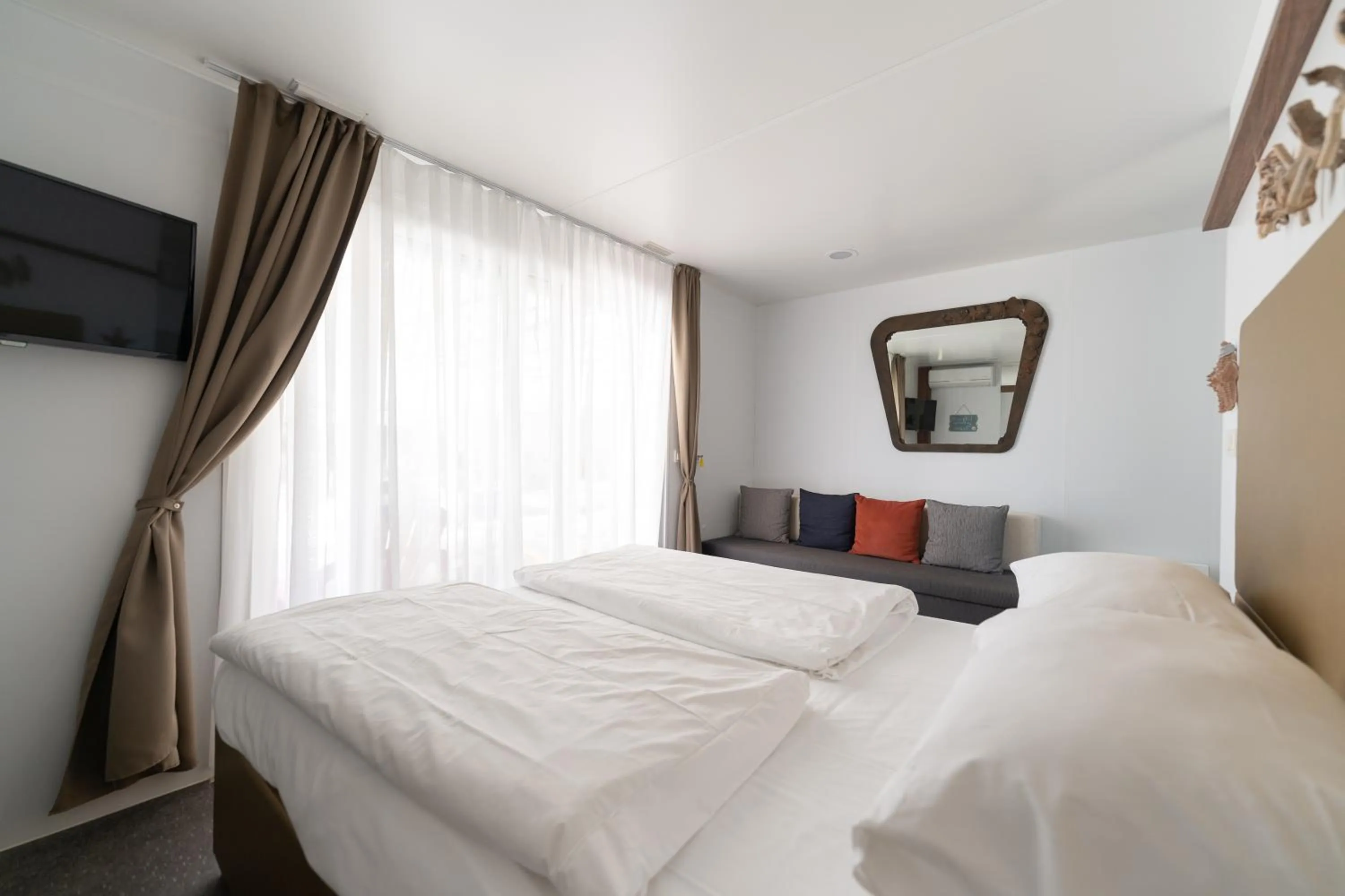 Bed in Barbara Piran Beach Hotel