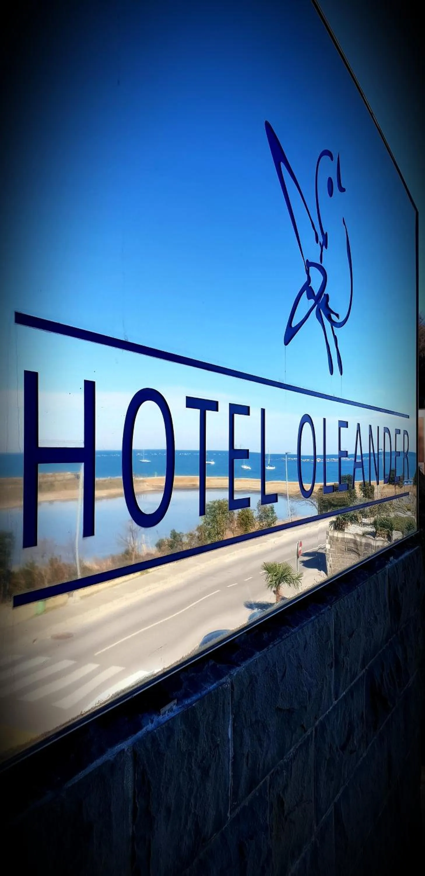 Property logo or sign in Hotel Oleander - Oleander Resort