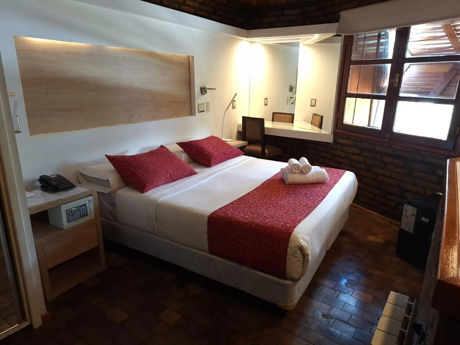 Bed in Portal del Lago Hotel