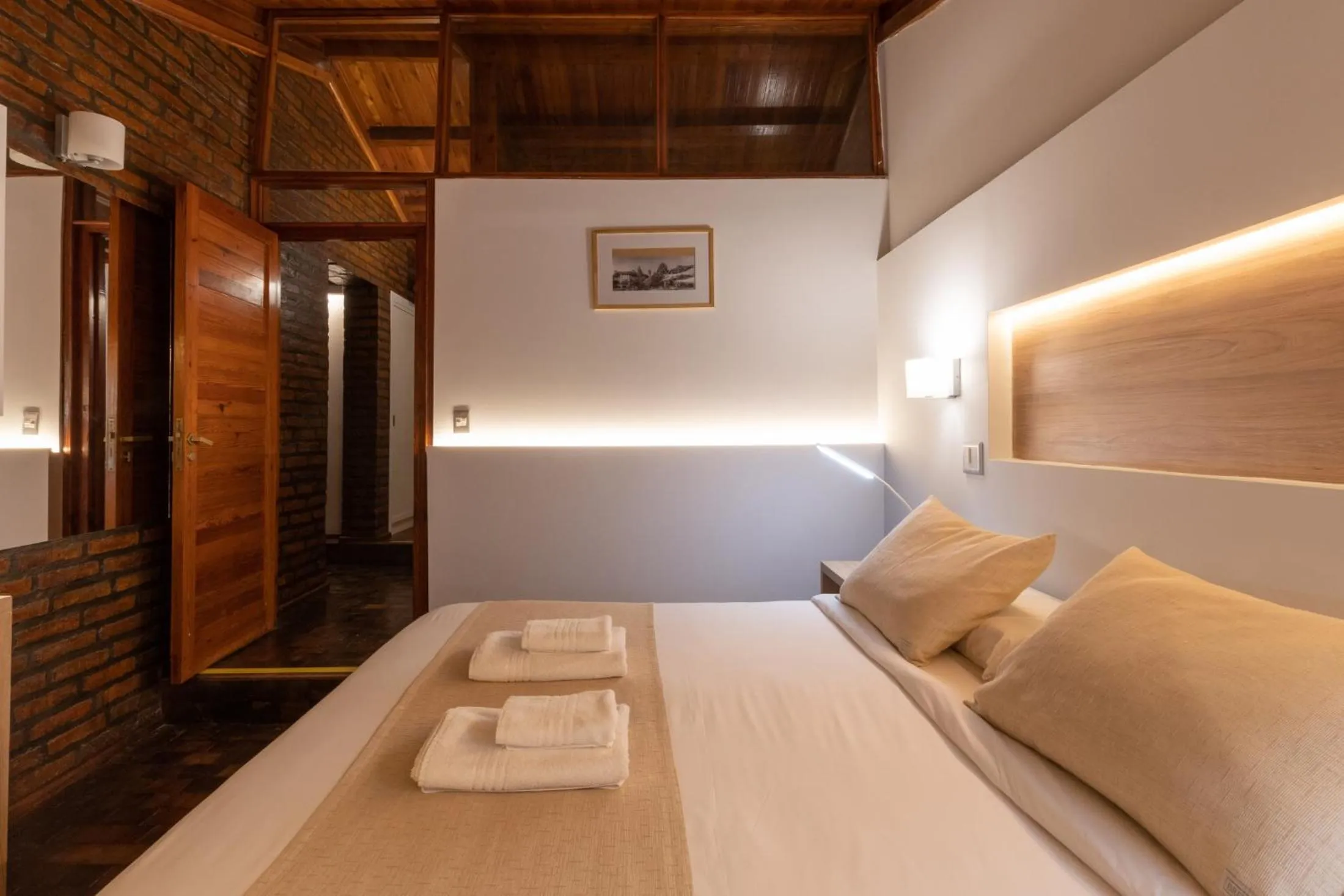 Bed in Portal del Lago Hotel