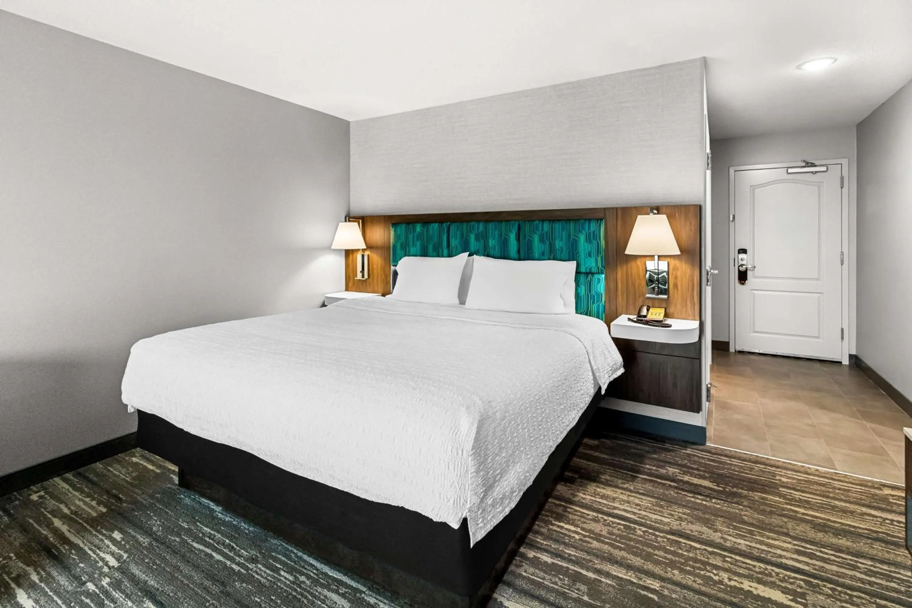 Bed in Hampton Inn by Hilton Dayton South