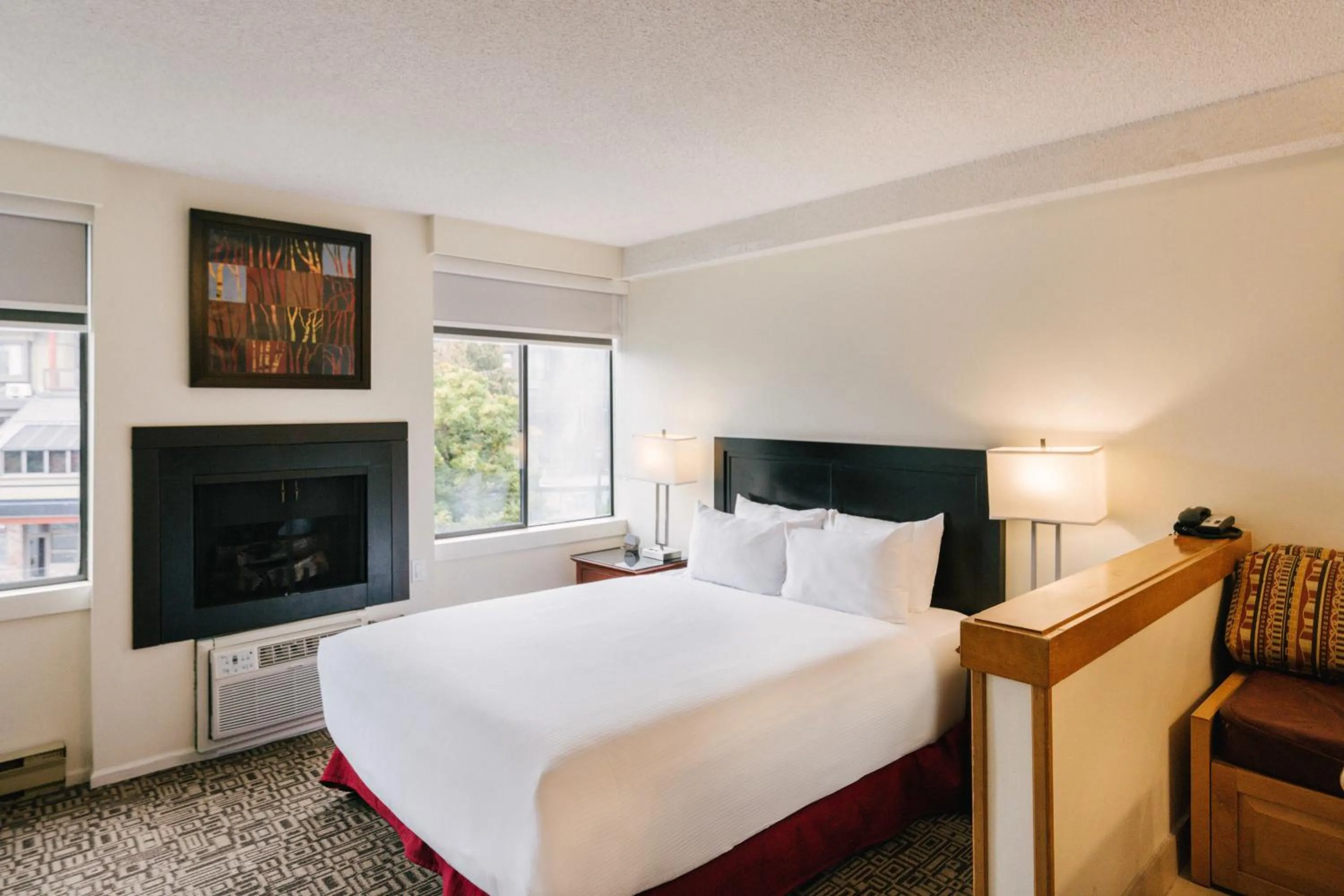 Bed in Mountain Side Hotel Whistler by Executive