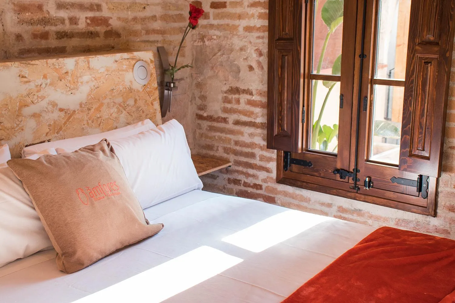 Bed in Àmfores Boutique Guest House