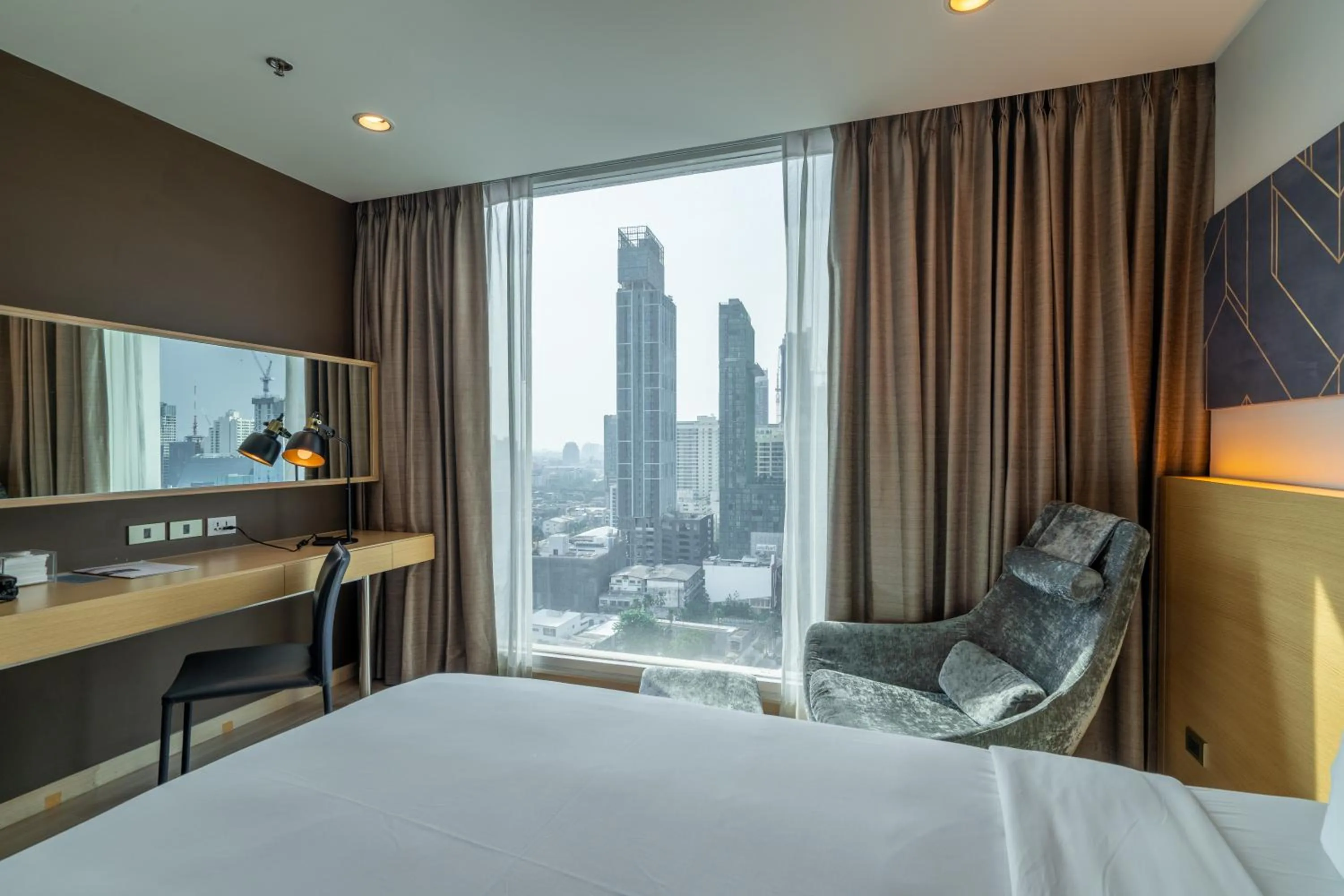 Seating area, Bed in VELA Dhi GLOW Pratunam