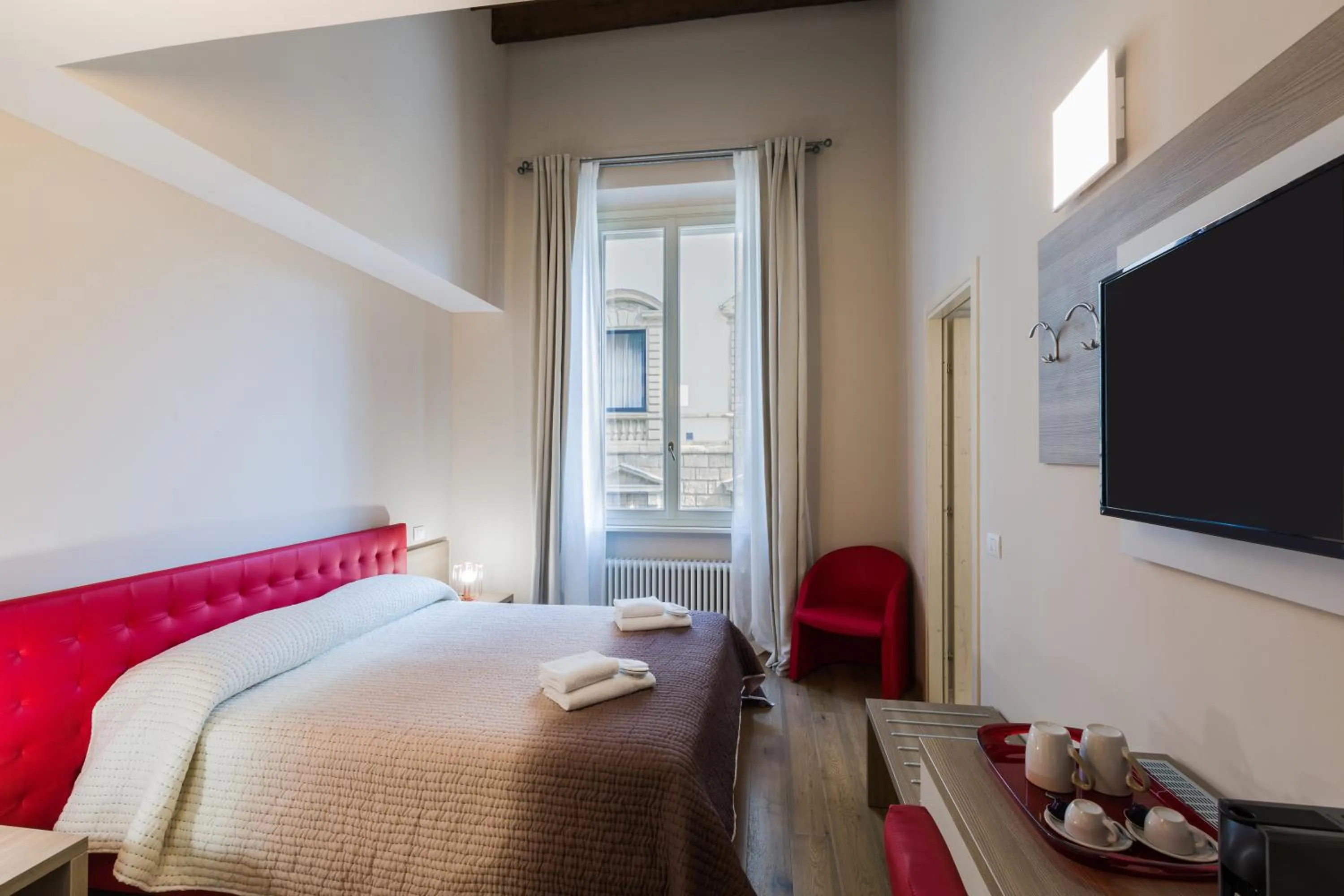 Bed in VRooms All'Angolo Del Duomo