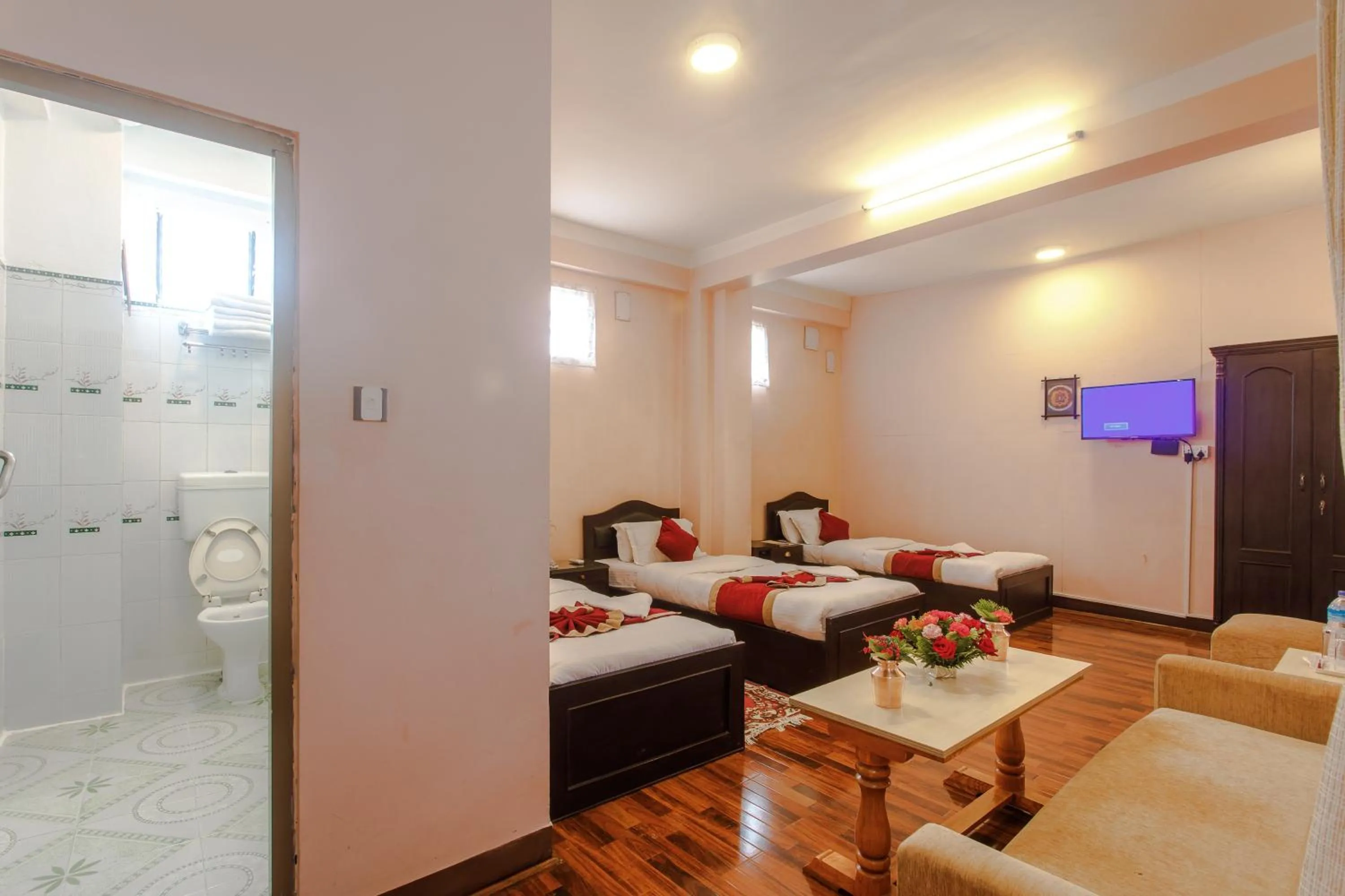 Seating area, Bed in Hotel Nepalaya