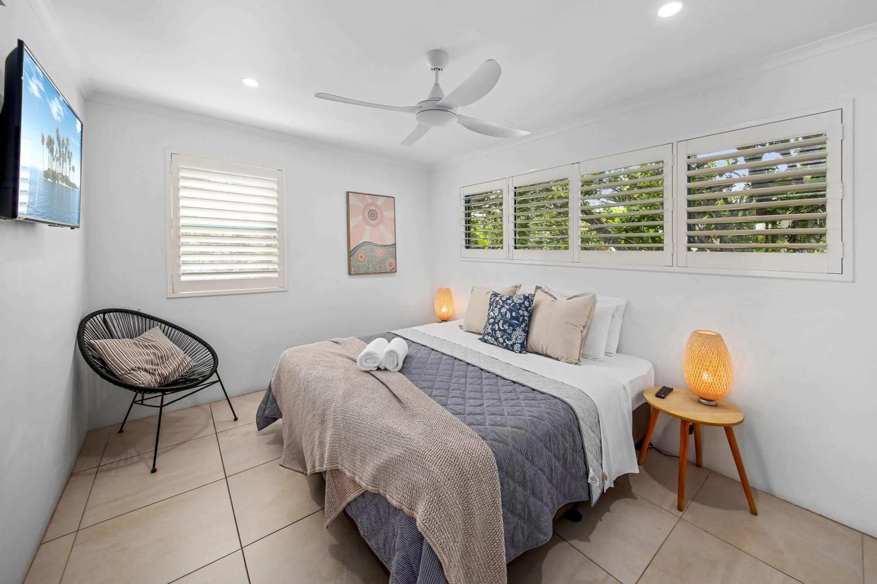 Bed in Chez Noosa Holiday Apartments