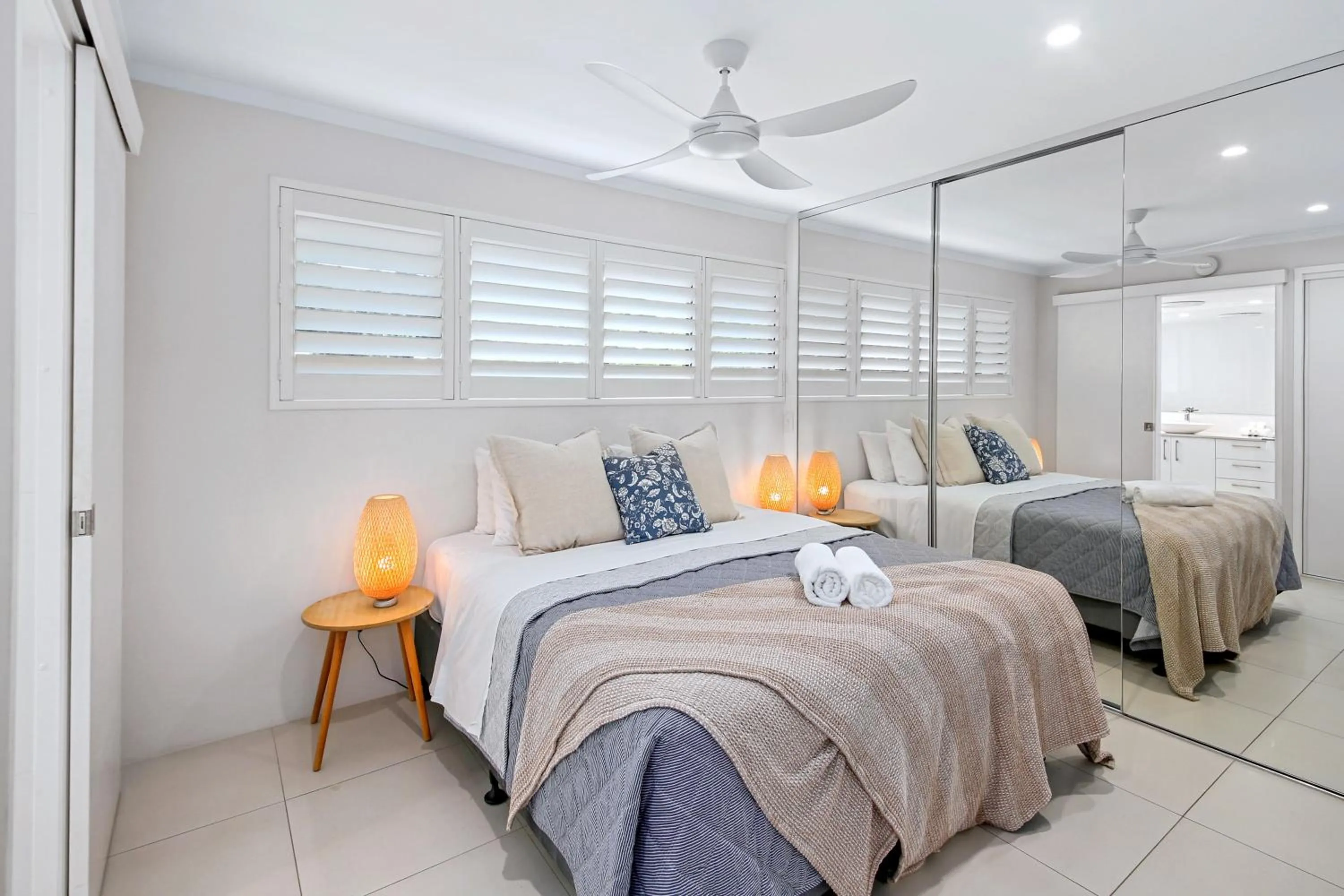 Bed in Chez Noosa Holiday Apartments