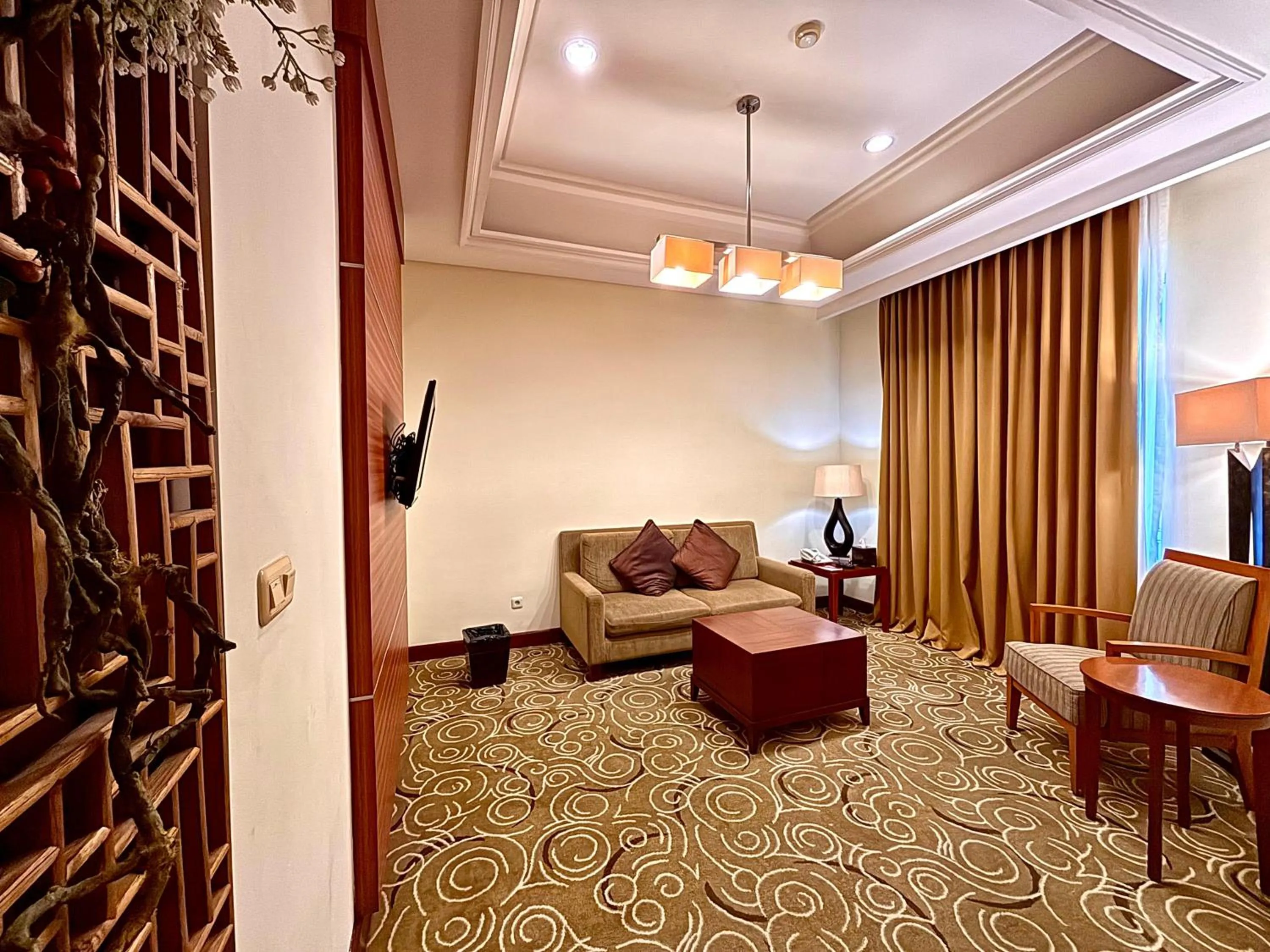 Living room in Manado Quality Hotel