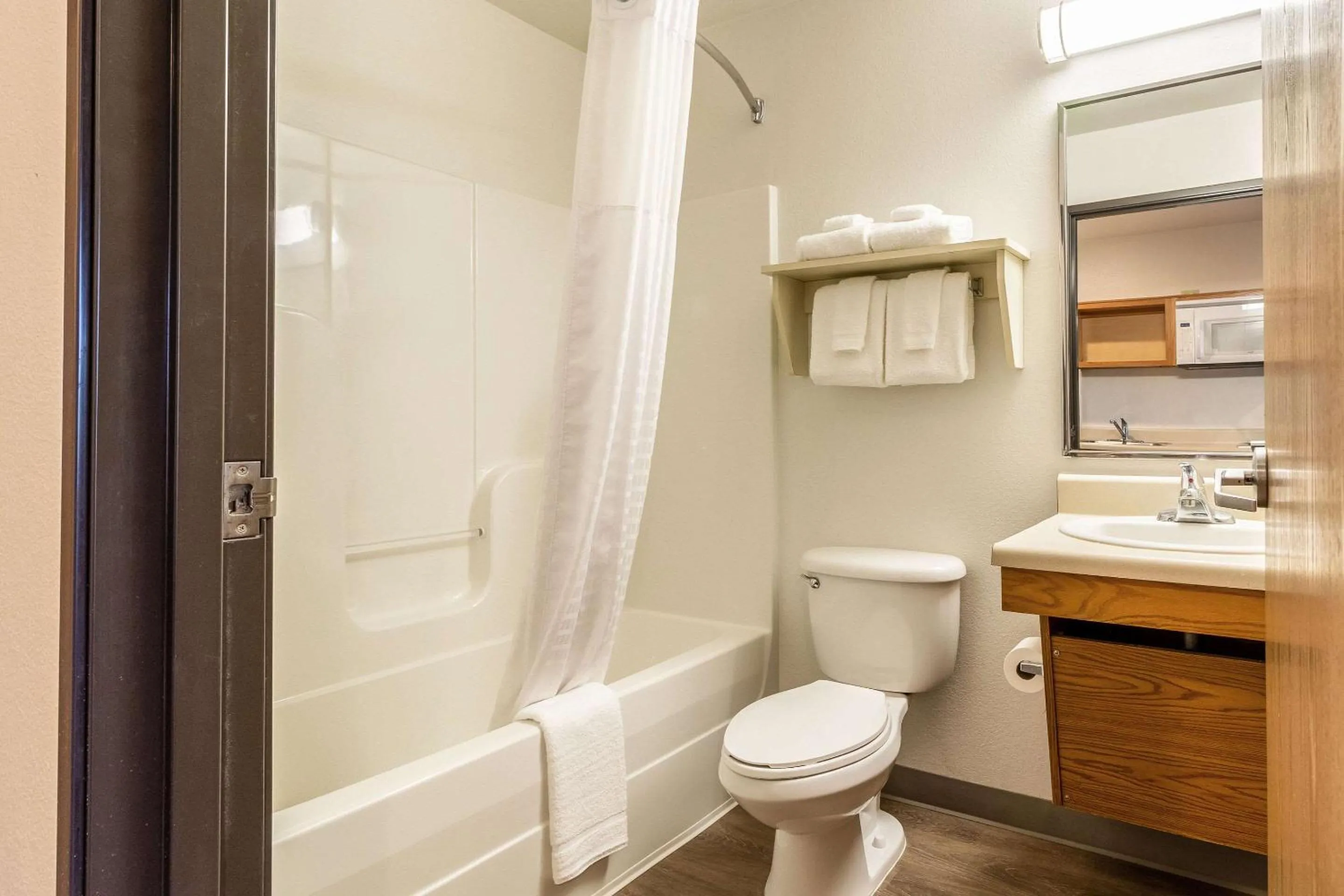 Bathroom in WoodSpring Suites Houston Baytown