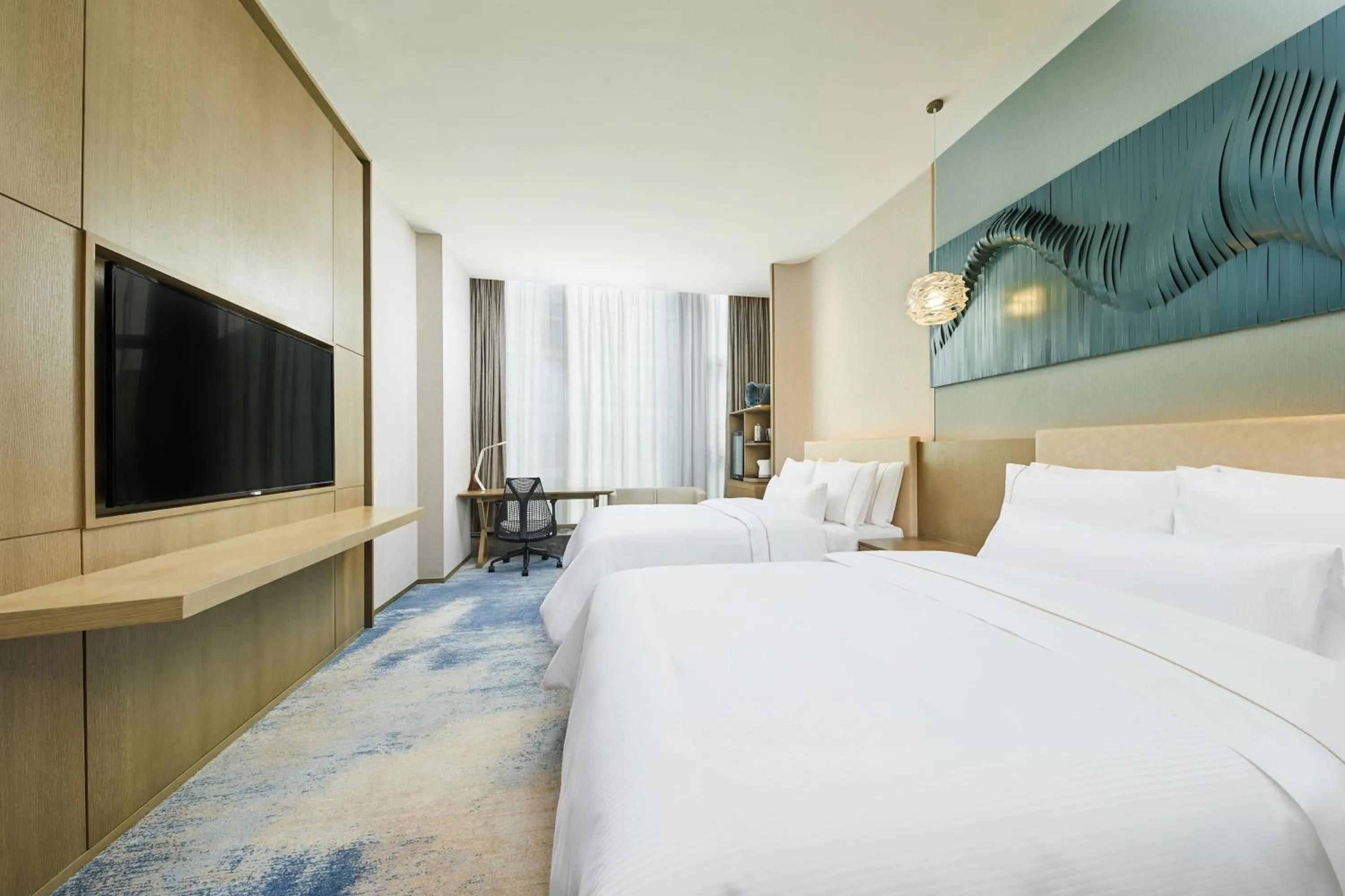 Bed in The Westin Qingdao West Coast
