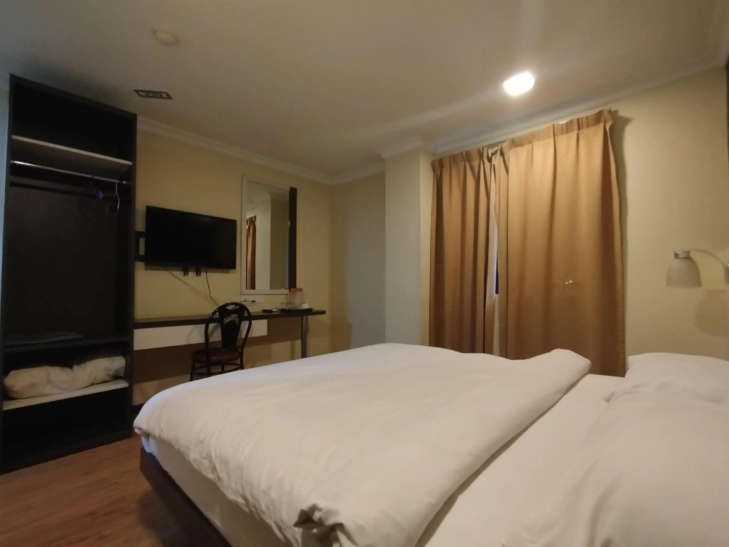 Bed in Hotel De Grand Orchard