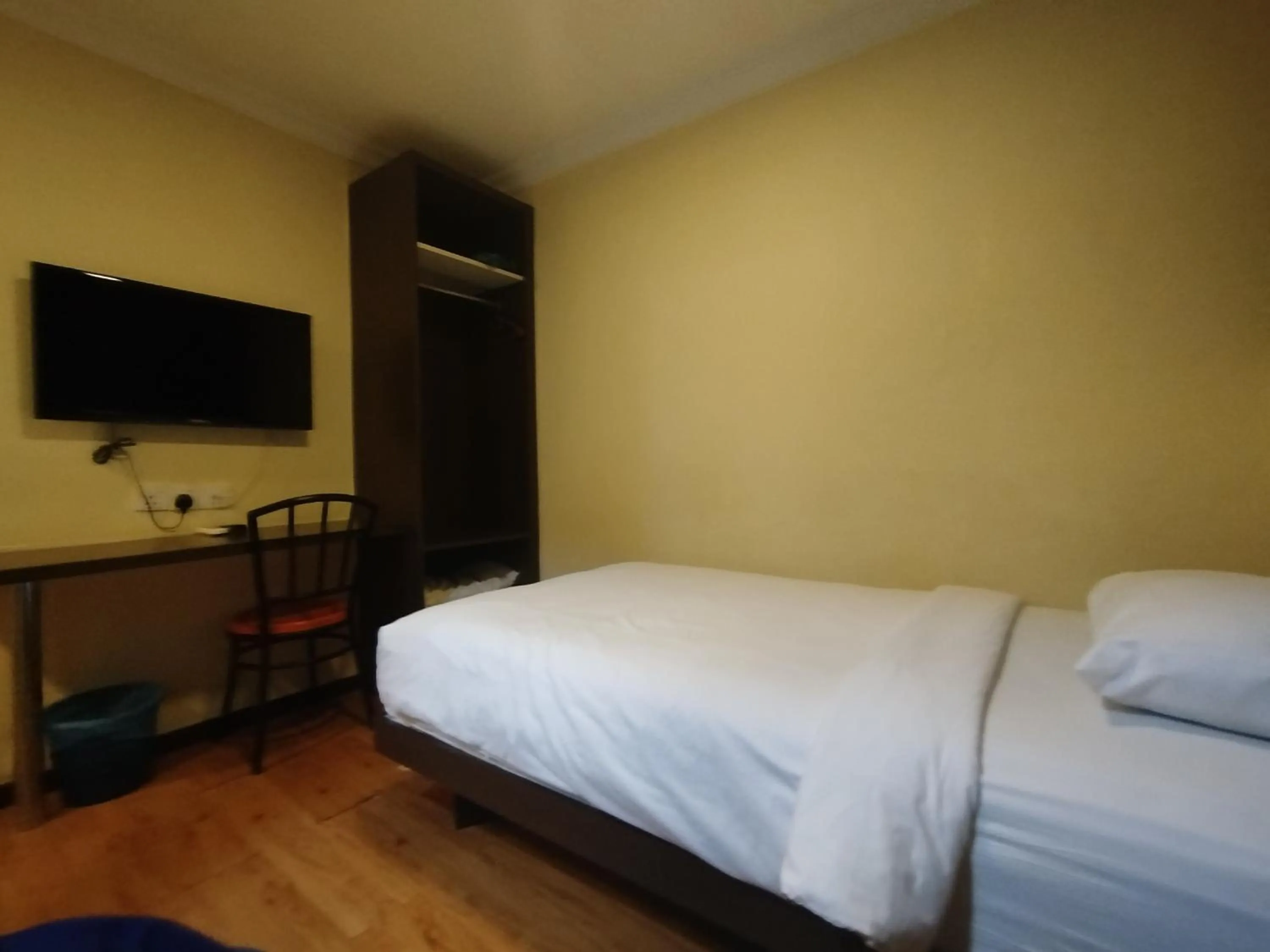 Bed in Hotel De Grand Orchard