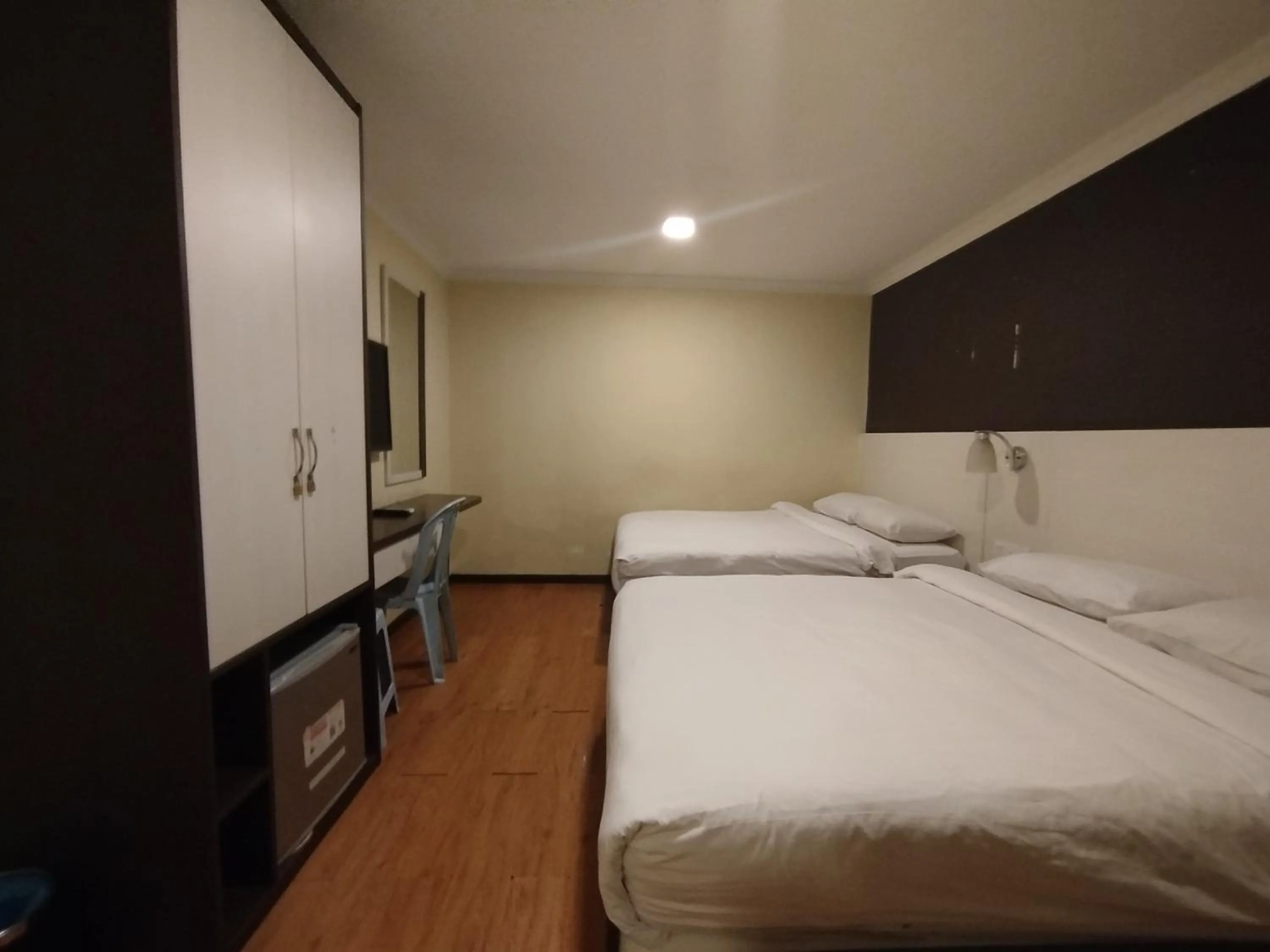 Bed in Hotel De Grand Orchard