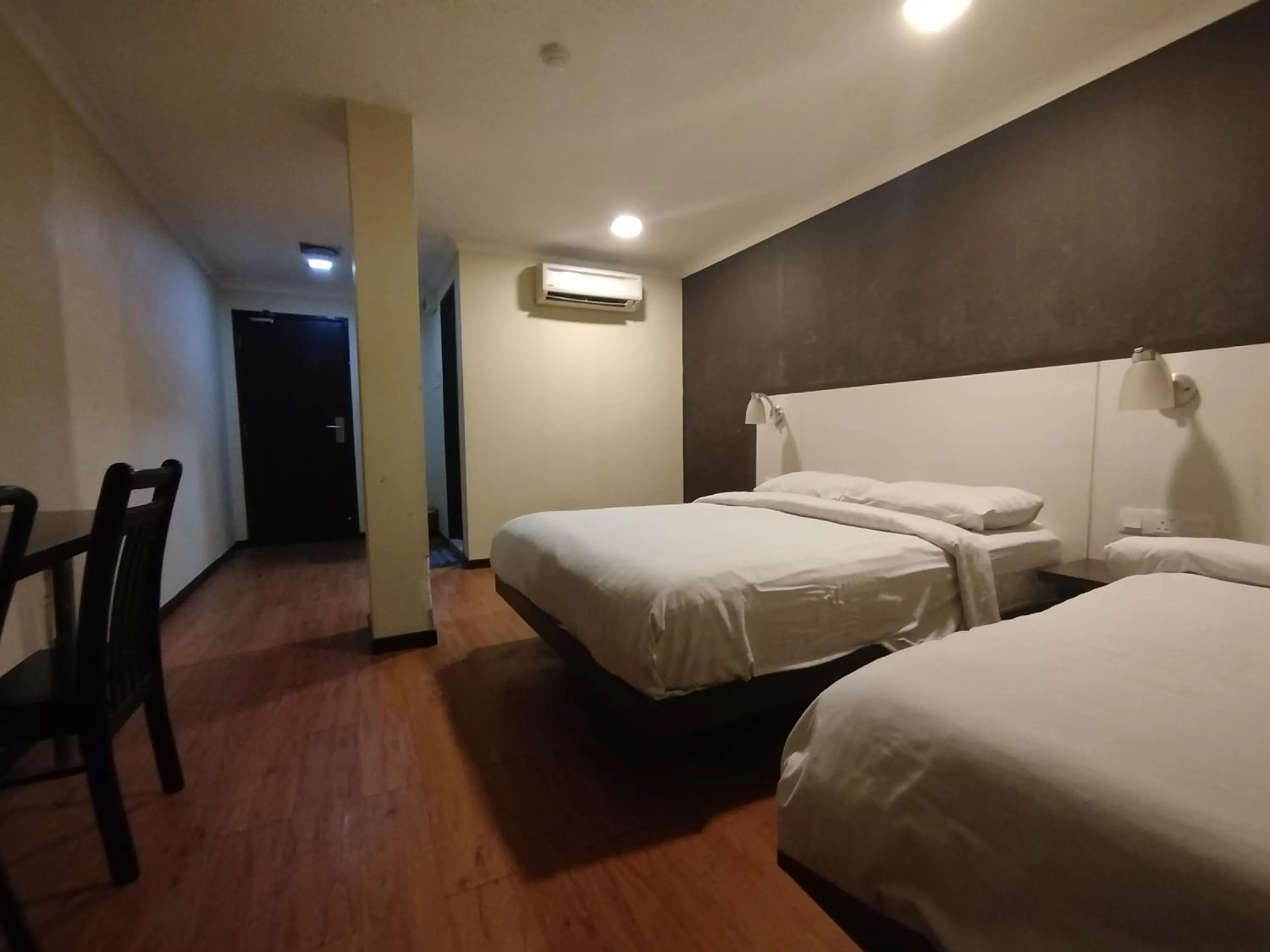 Bed in Hotel De Grand Orchard