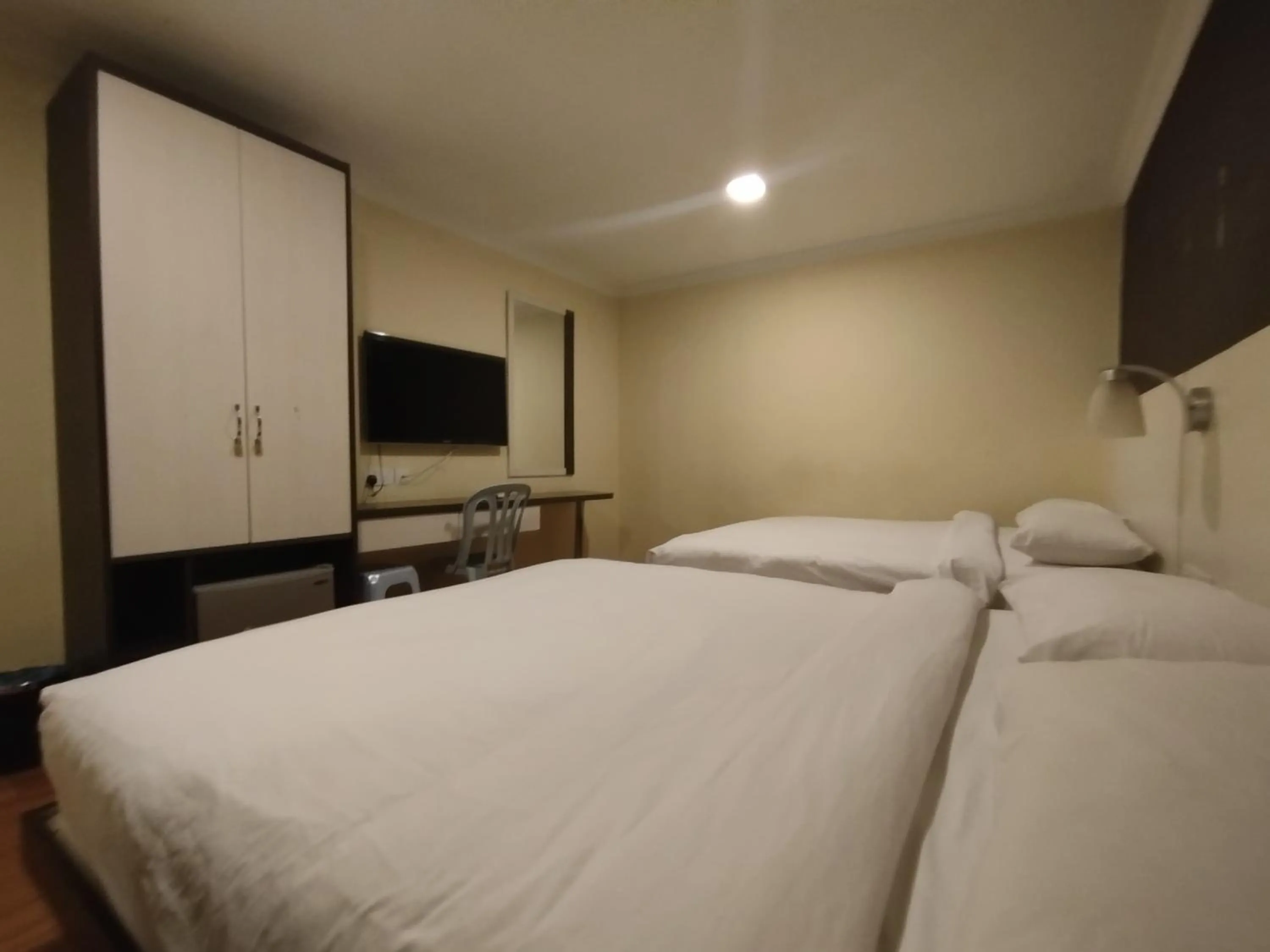 Bed in Hotel De Grand Orchard