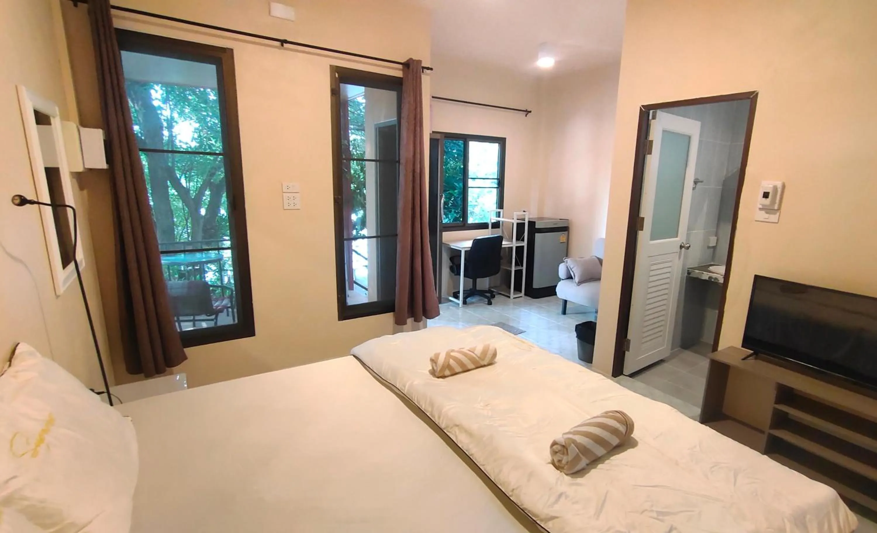 Bed in Moon River Resort Phimai