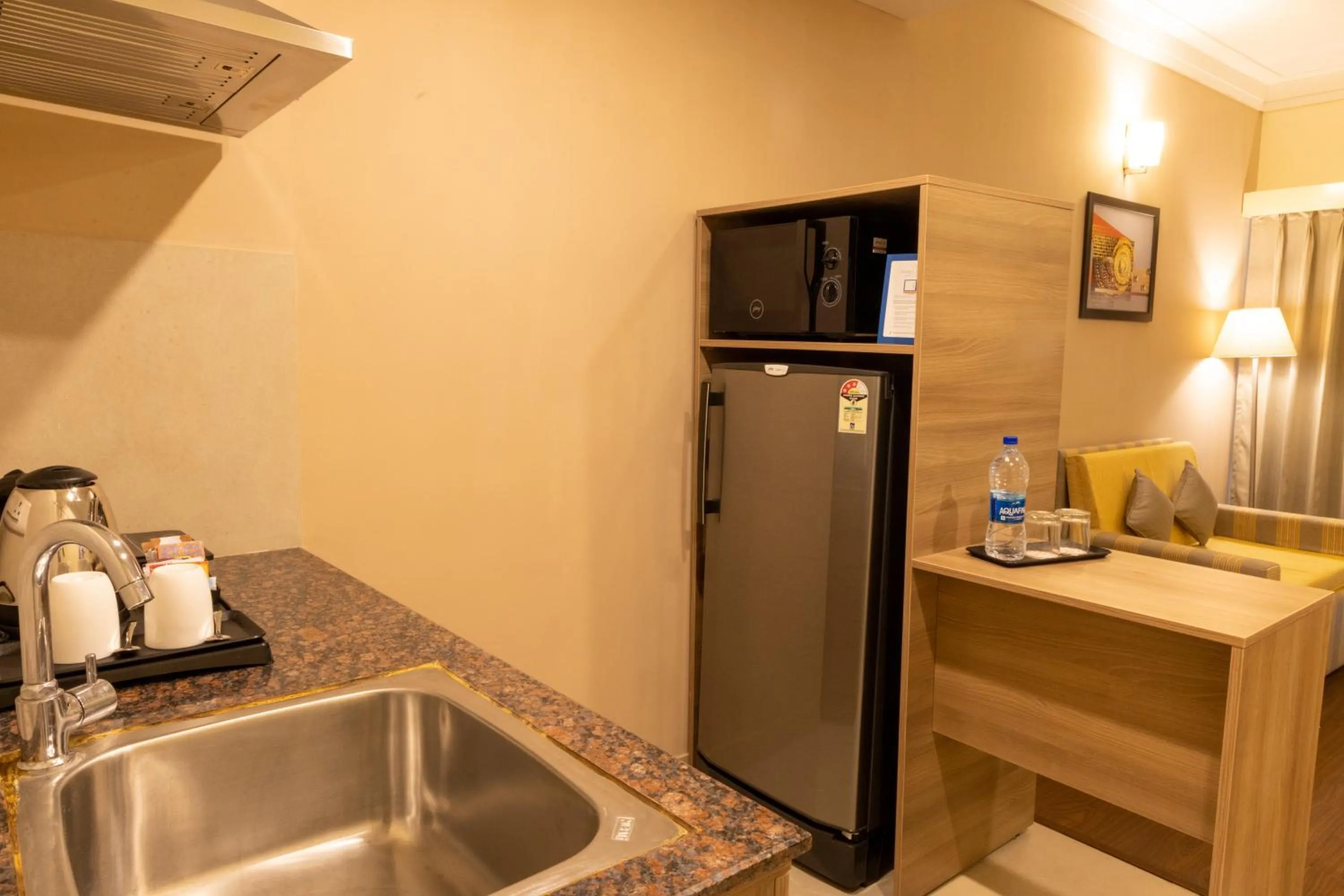 Kitchen or kitchenette in Starlit Suites Tirupati