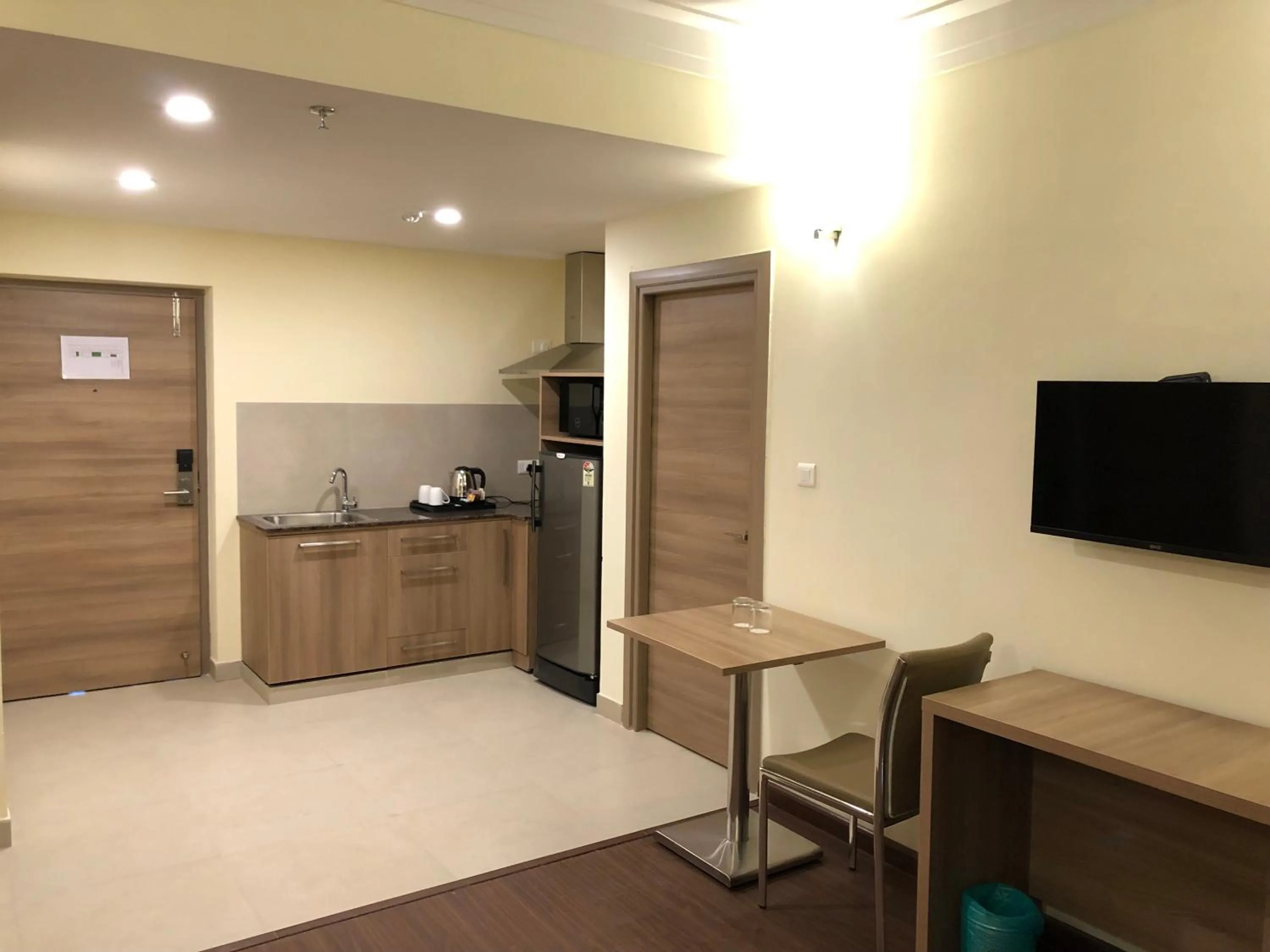 Kitchen or kitchenette in Starlit Suites Tirupati