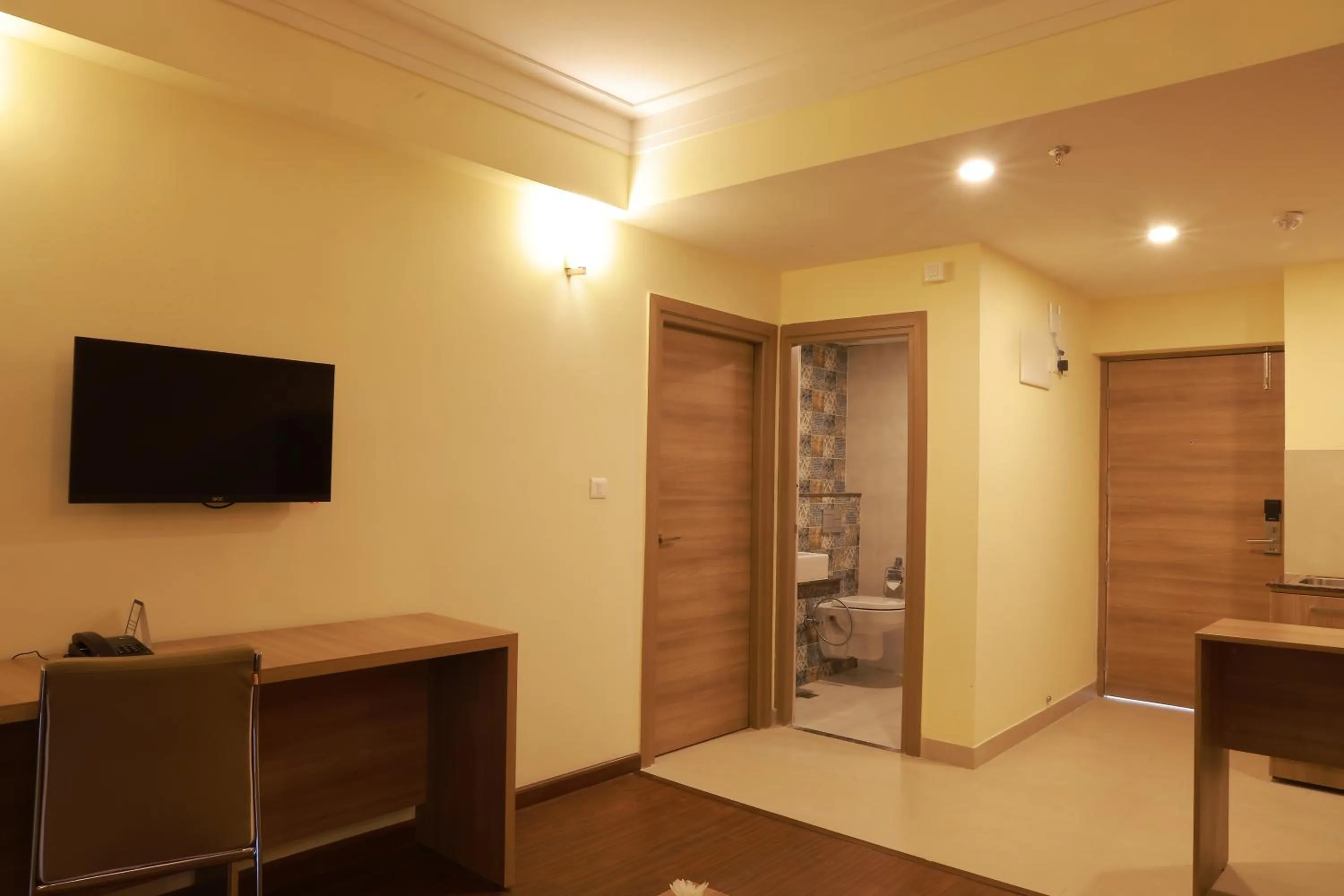 Kitchen or kitchenette in Starlit Suites Tirupati