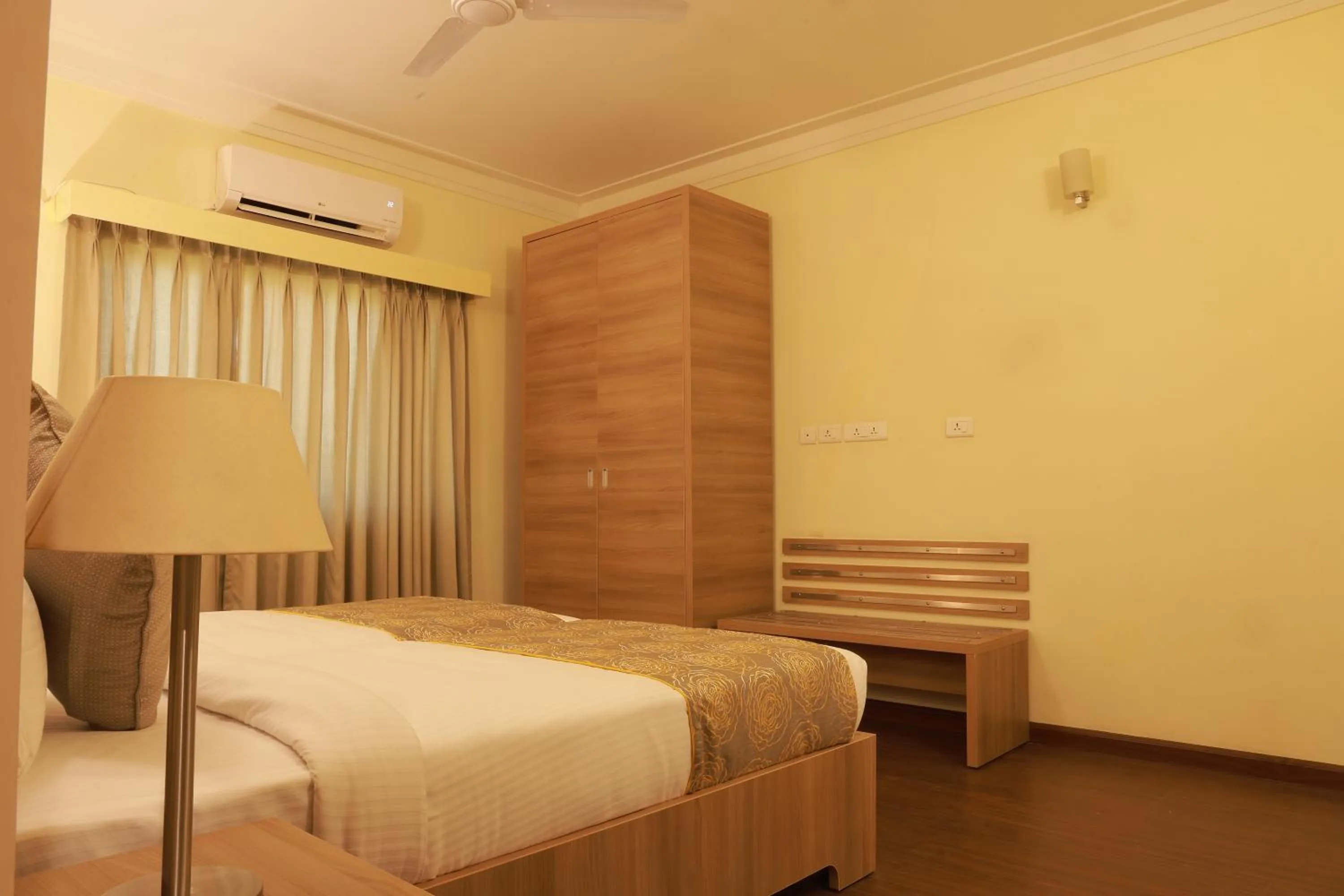 Bedroom in Starlit Suites Tirupati