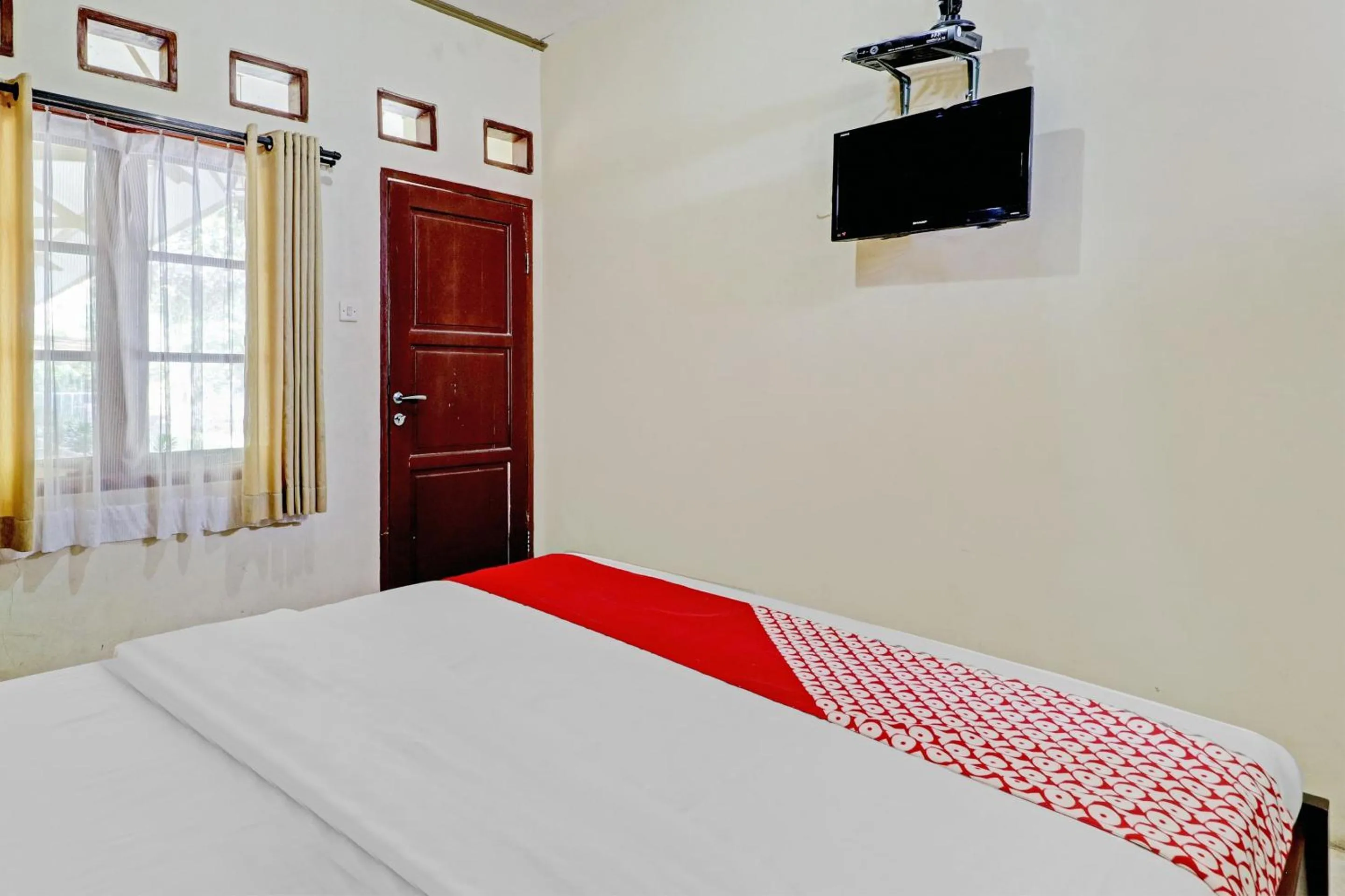 Bedroom in Collection O 90461 Graha Atmadja Syariah Guest House