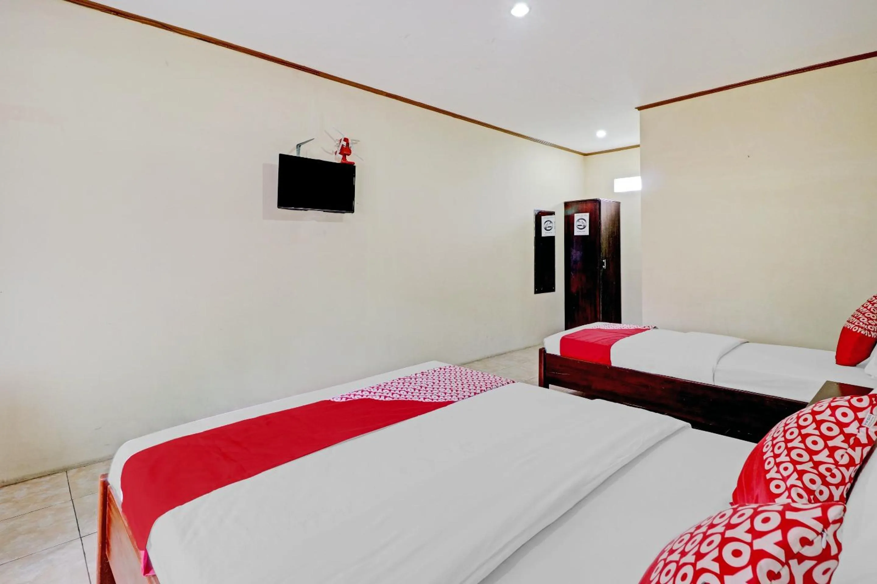 Bedroom in Collection O 90461 Graha Atmadja Syariah Guest House
