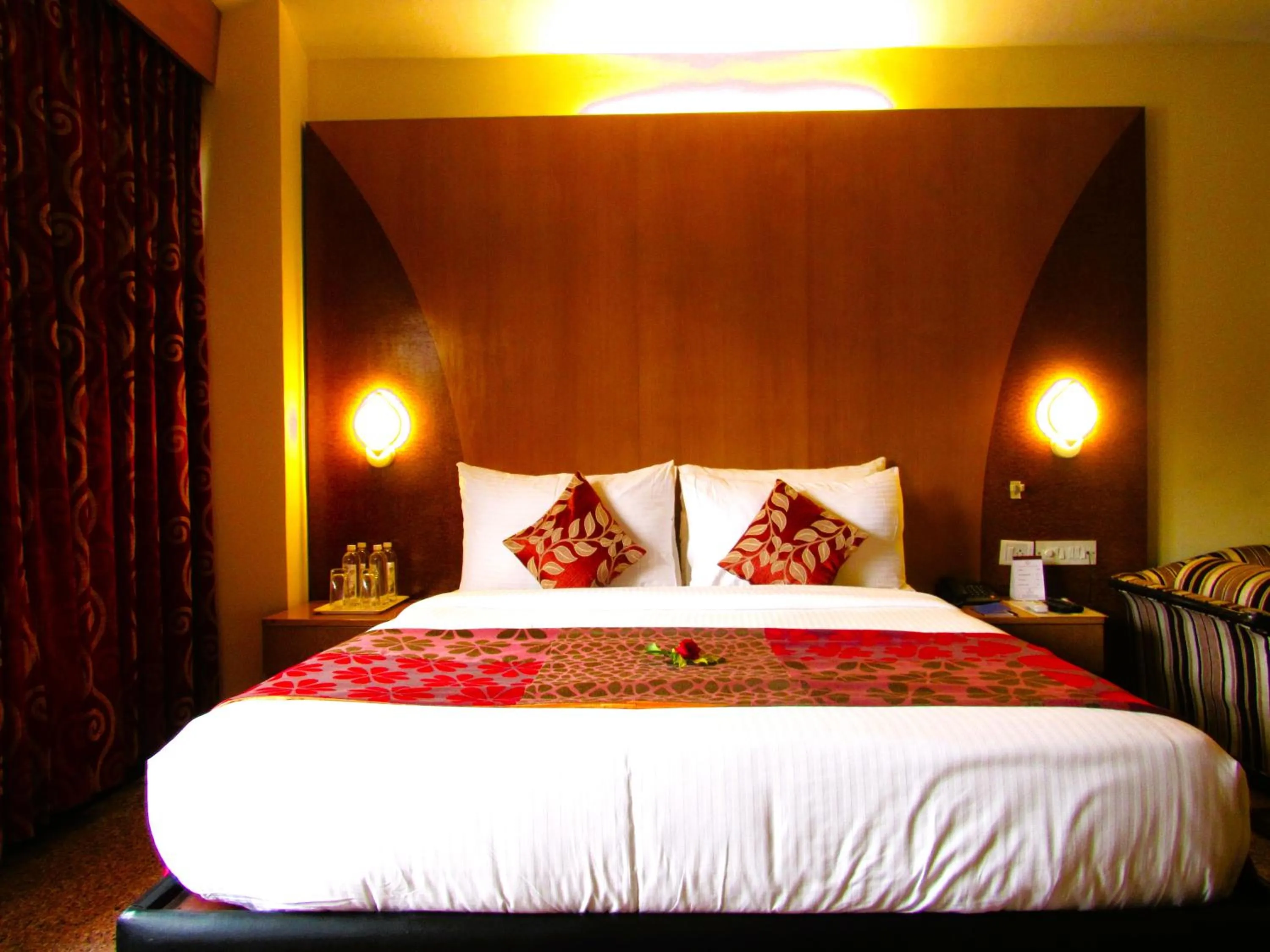 Bed in Ramanashree California Resort