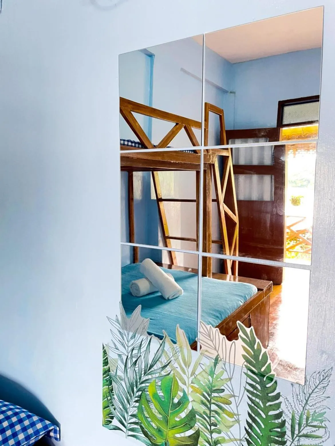 Bed in Camiguin Blue Lagoon Cottages