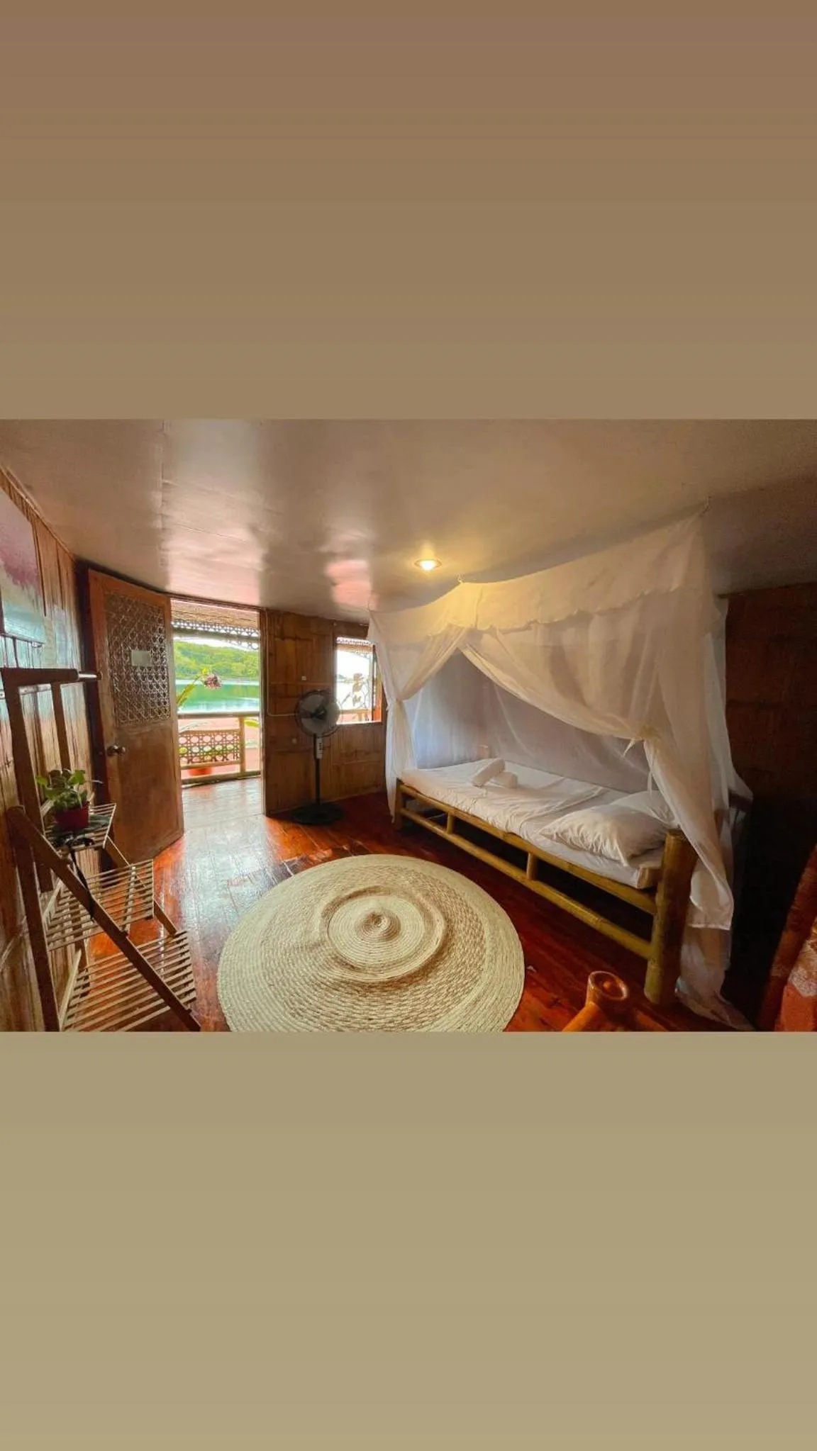 Bed in Camiguin Blue Lagoon Cottages